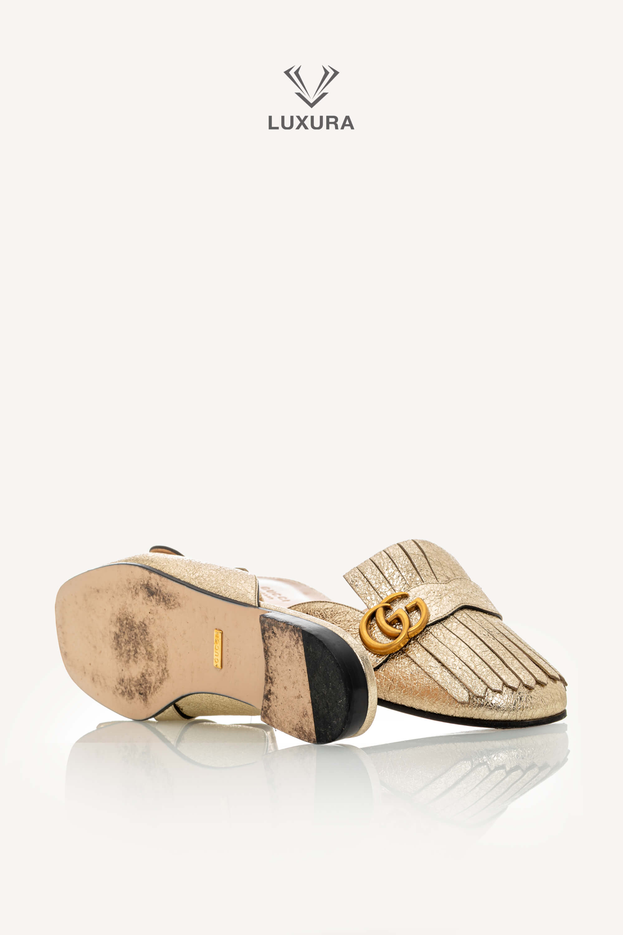 <span style="font-size: 10px;letter-spacing: .15em">BEST DEAL</span><br> <strong>GUCCI</strong><br> <div style="margin-top:10px;font-size:16px">Metallic Marmont Fringed Flat Mules Gold 41 ( true size 40 )</div><br> - Image 18