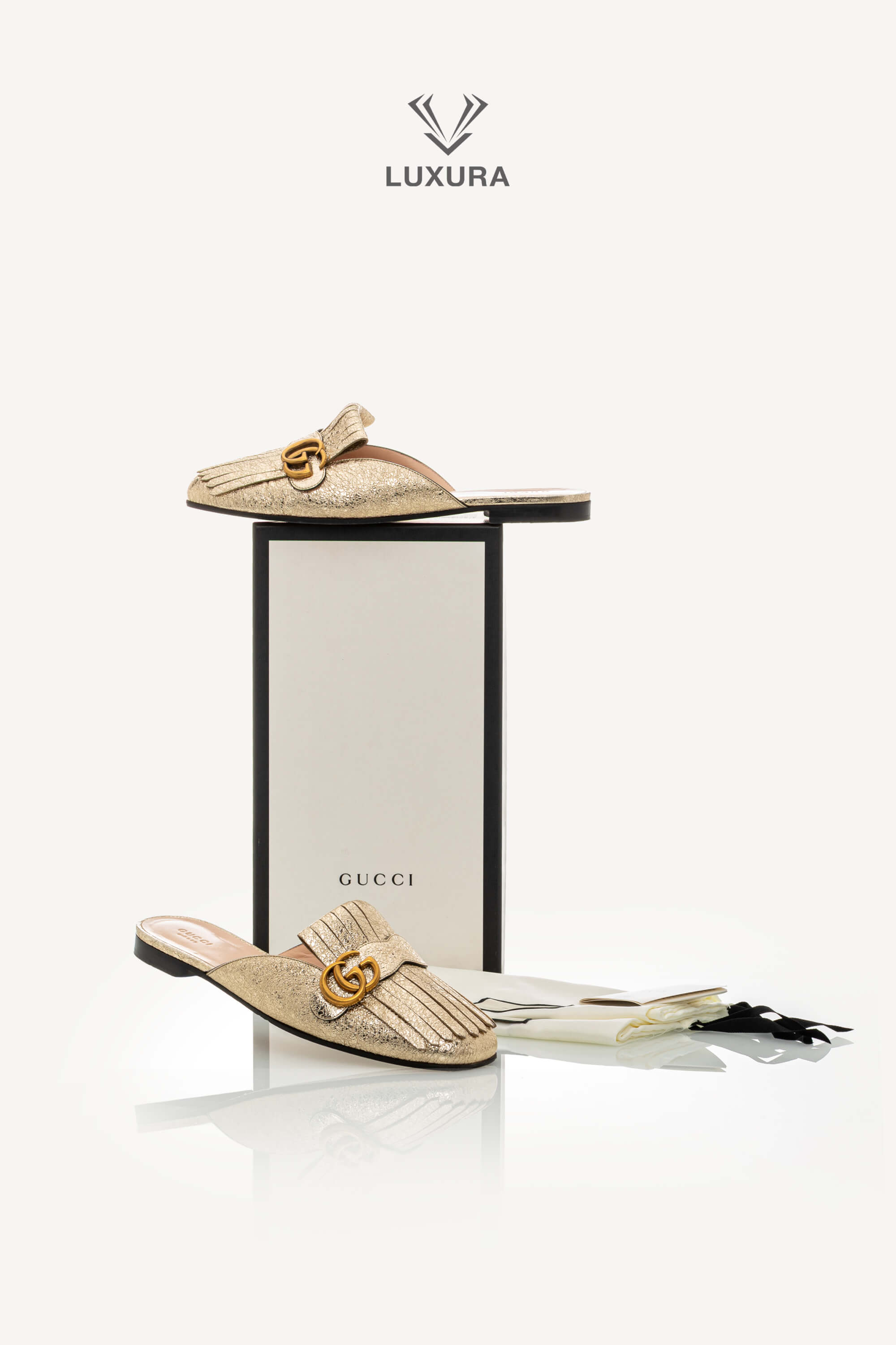 <span style="font-size: 10px;letter-spacing: .15em">BEST DEAL</span><br> <strong>GUCCI</strong><br> <div style="margin-top:10px;font-size:16px">Metallic Marmont Fringed Flat Mules Gold 41 ( true size 40 )</div><br> - Image 2