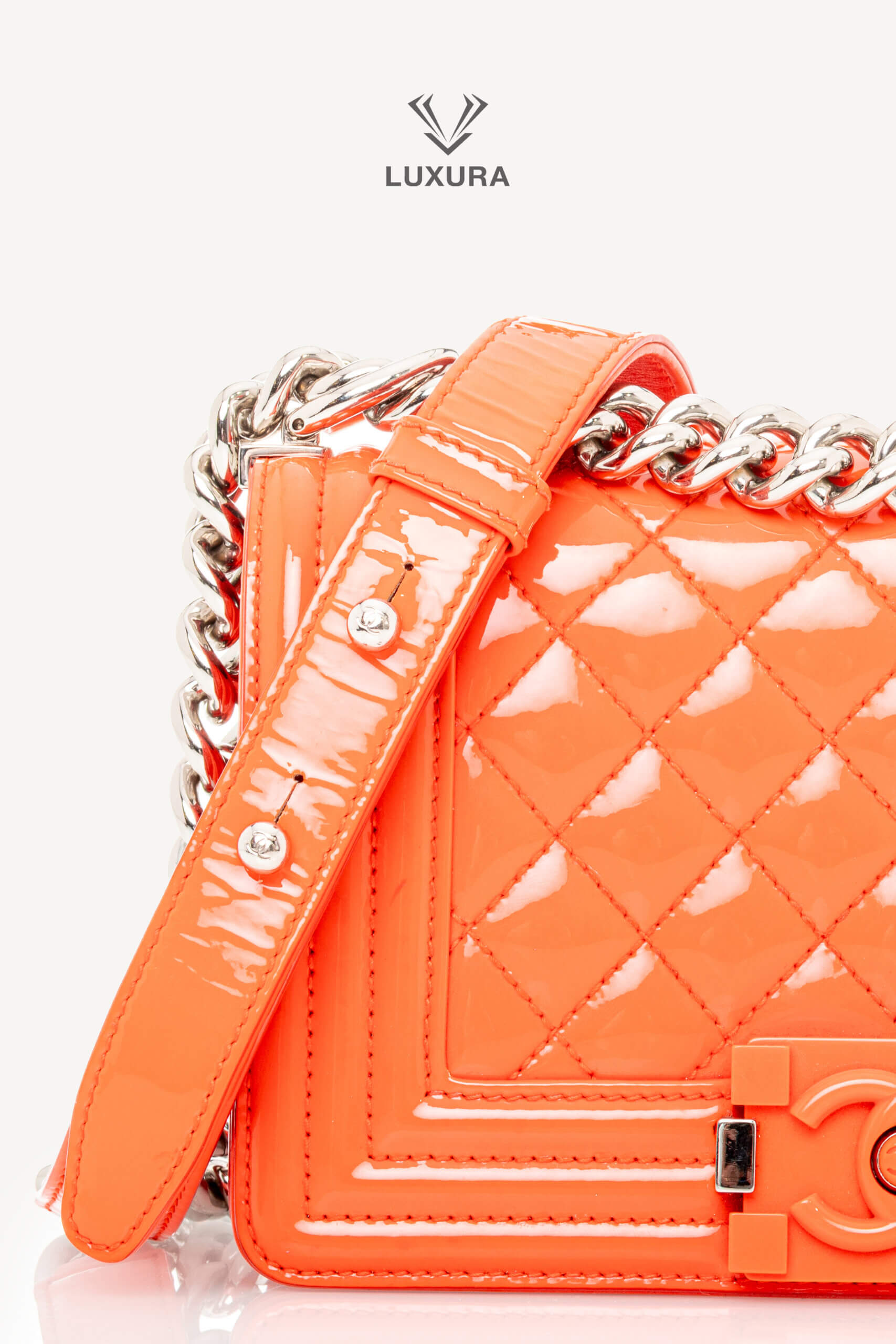 <span style="font-size: 10px;letter-spacing: .15em">HARD TO FIND</span><br>            <strong>CHANEL</strong><br>            <div style="margin-top:10px;font-size:16px">Boy Orange Patent Plexis Glass Silver Hardware Bag</div><br> - Image 17