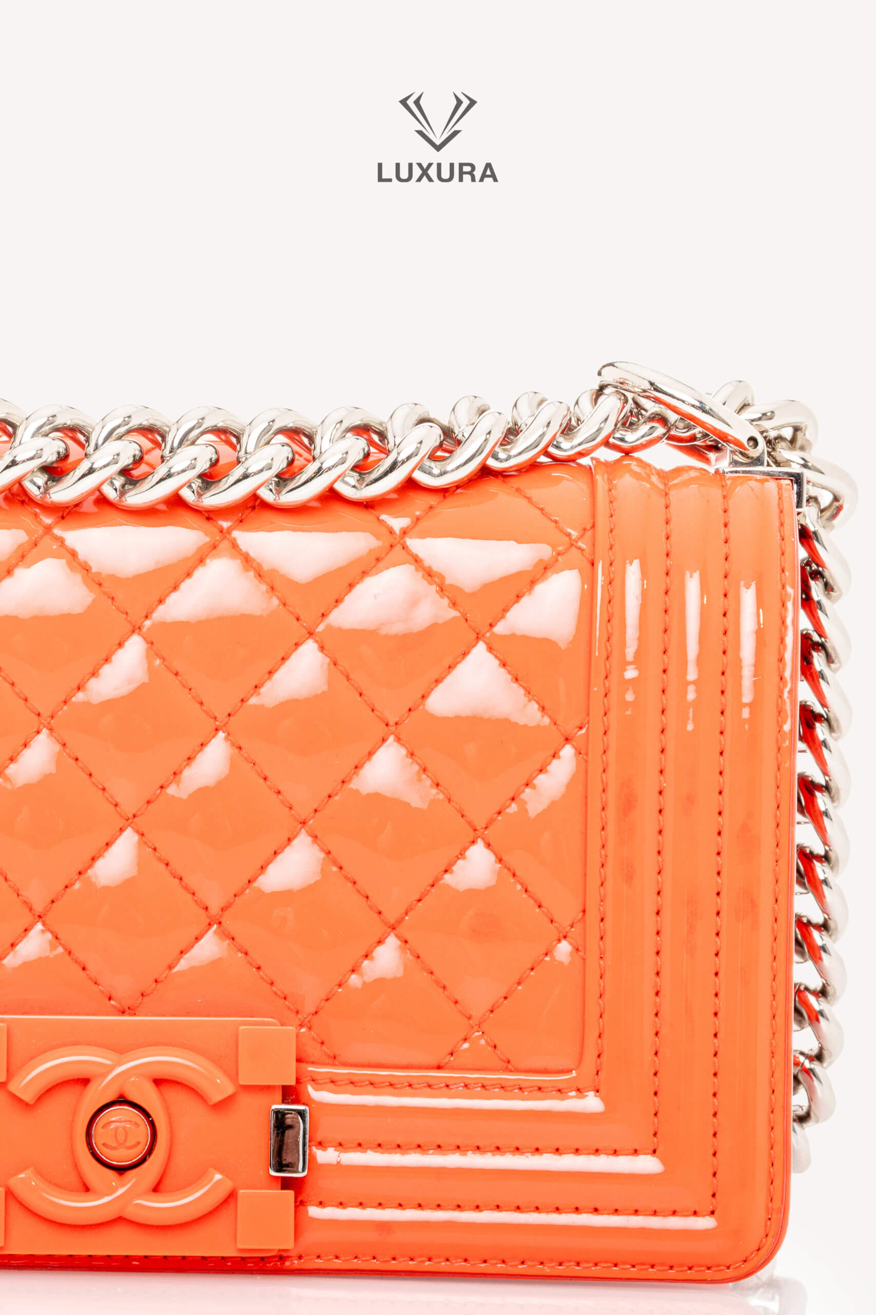 <span style="font-size: 10px;letter-spacing: .15em">HARD TO FIND</span><br>            <strong>CHANEL</strong><br>            <div style="margin-top:10px;font-size:16px">Boy Orange Patent Plexis Glass Silver Hardware Bag</div><br> - Image 18