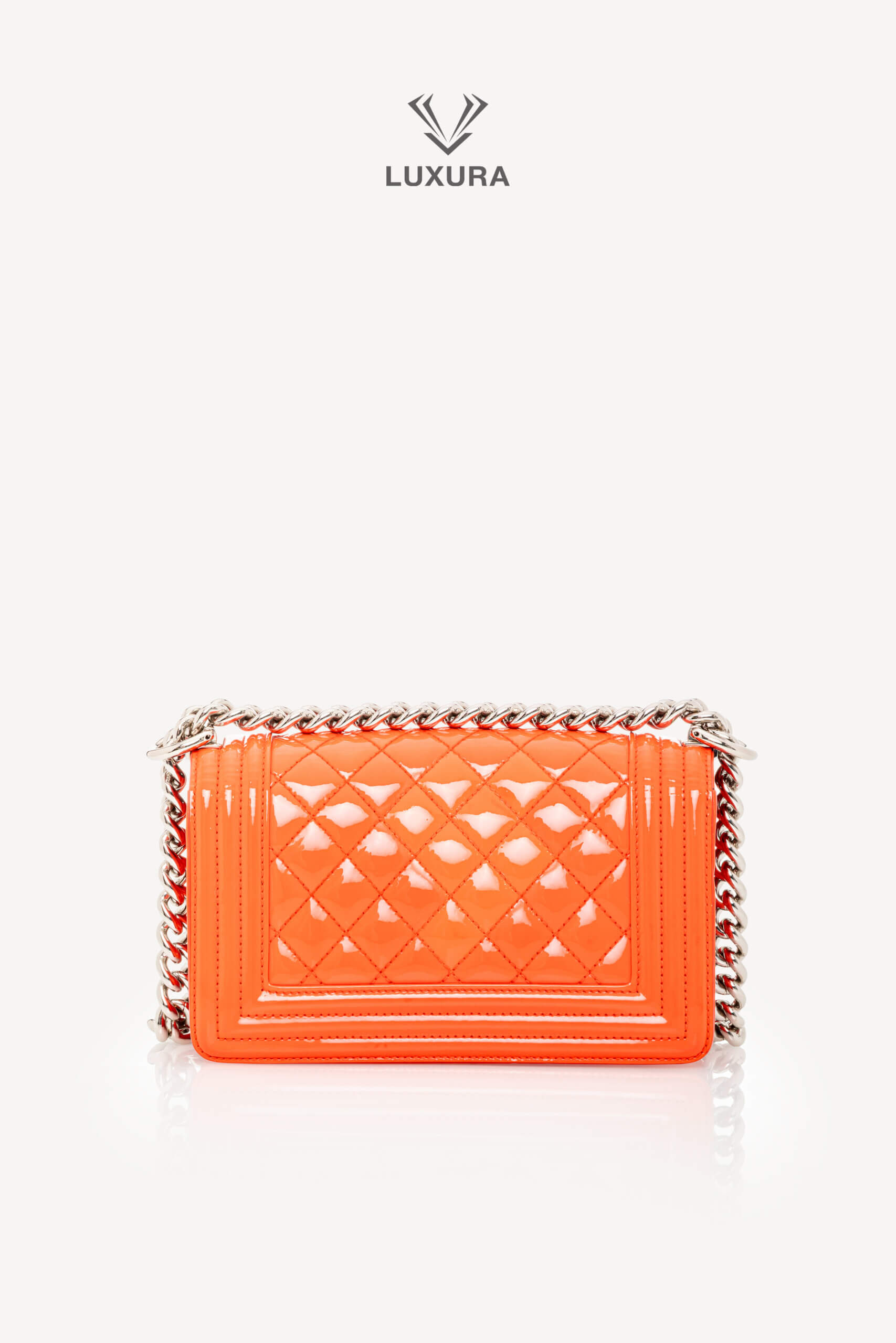 <span style="font-size: 10px;letter-spacing: .15em">HARD TO FIND</span><br>            <strong>CHANEL</strong><br>            <div style="margin-top:10px;font-size:16px">Boy Orange Patent Plexis Glass Silver Hardware Bag</div><br> - Image 9
