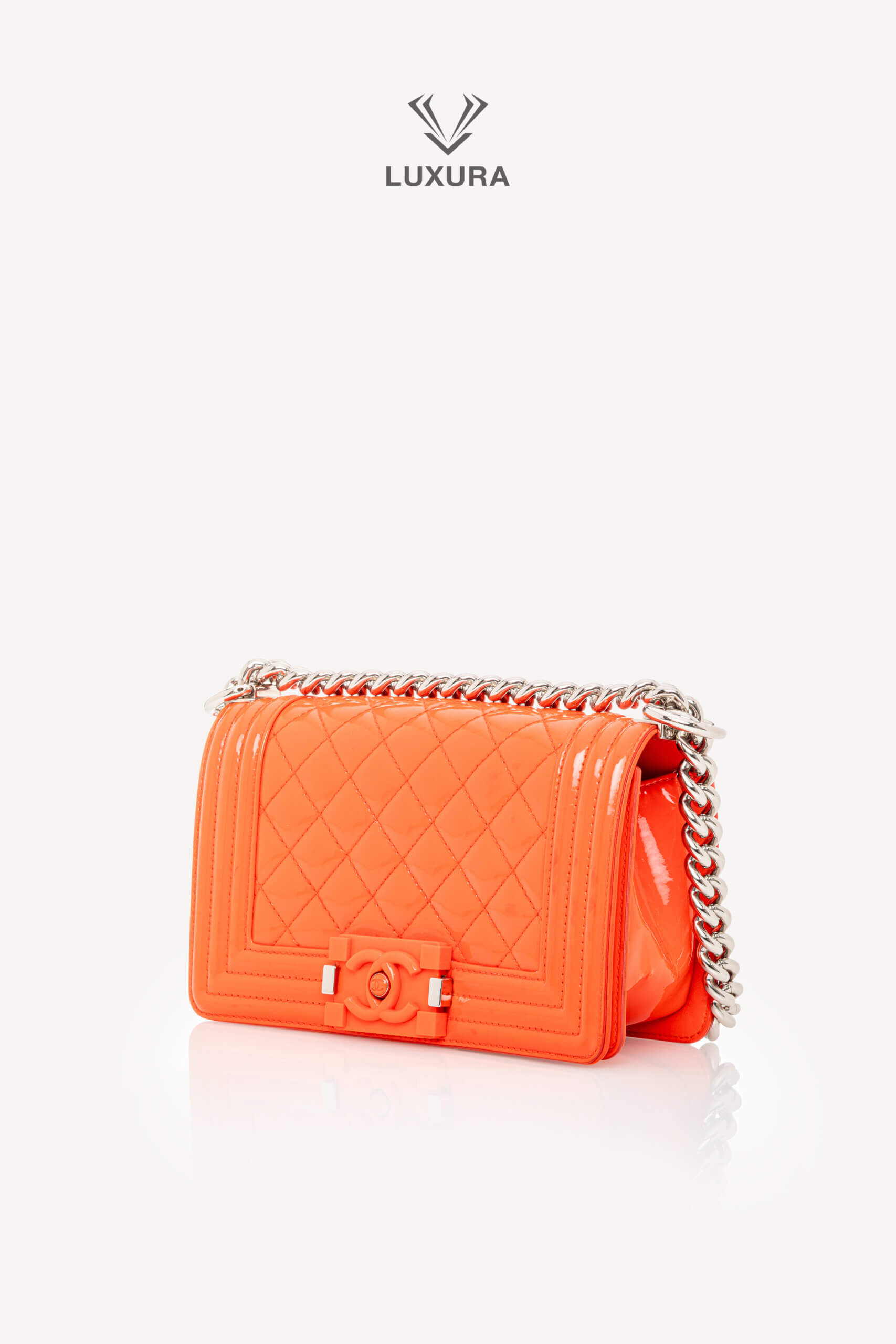 <span style="font-size: 10px;letter-spacing: .15em">HARD TO FIND</span><br>            <strong>CHANEL</strong><br>            <div style="margin-top:10px;font-size:16px">Boy Orange Patent Plexis Glass Silver Hardware Bag</div><br> - Image 12