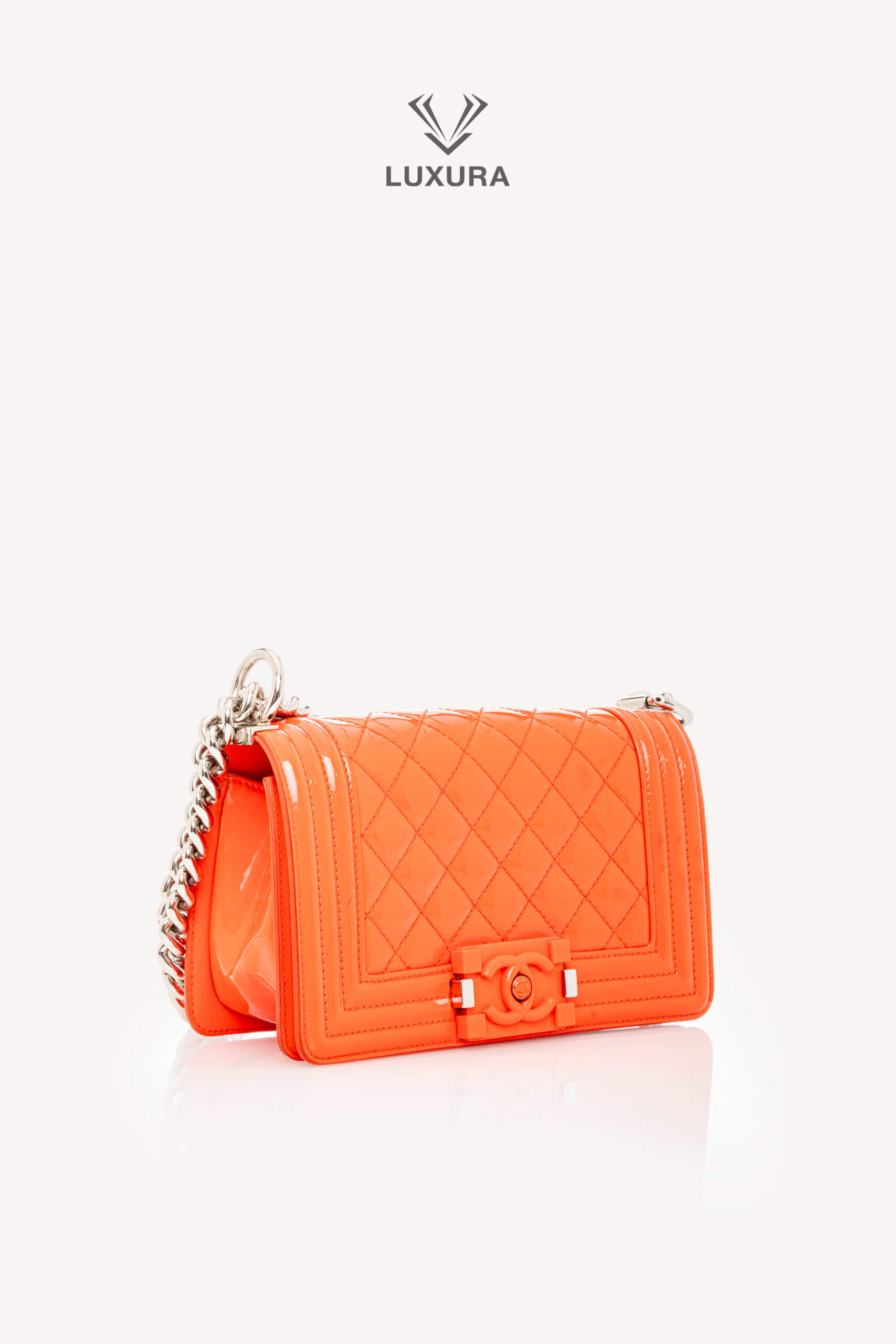 <span style="font-size: 10px;letter-spacing: .15em">HARD TO FIND</span><br>            <strong>CHANEL</strong><br>            <div style="margin-top:10px;font-size:16px">Boy Orange Patent Plexis Glass Silver Hardware Bag</div><br> - Image 6