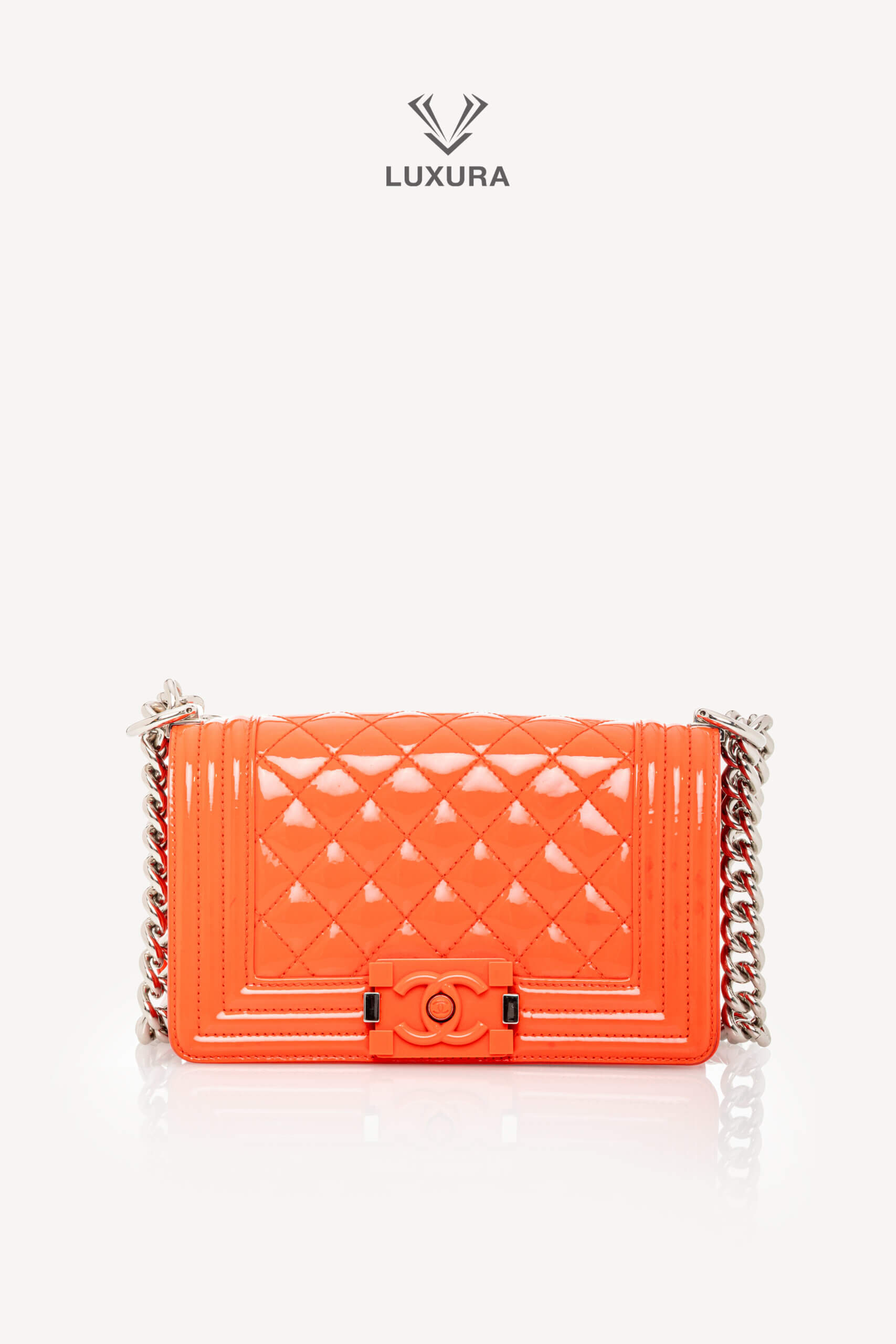 <span style="font-size: 10px;letter-spacing: .15em">HARD TO FIND</span><br>            <strong>CHANEL</strong><br>            <div style="margin-top:10px;font-size:16px">Boy Orange Patent Plexis Glass Silver Hardware Bag</div><br> - Image 8
