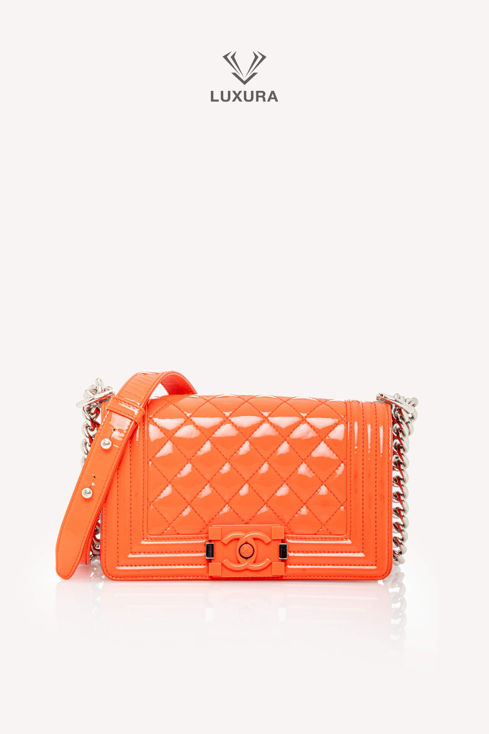 <span style="font-size: 10px;letter-spacing: .15em">HARD TO FIND</span><br>            <strong>CHANEL</strong><br>            <div style="margin-top:10px;font-size:16px">Boy Orange Patent Plexis Glass Silver Hardware Bag</div><br> - Image 7