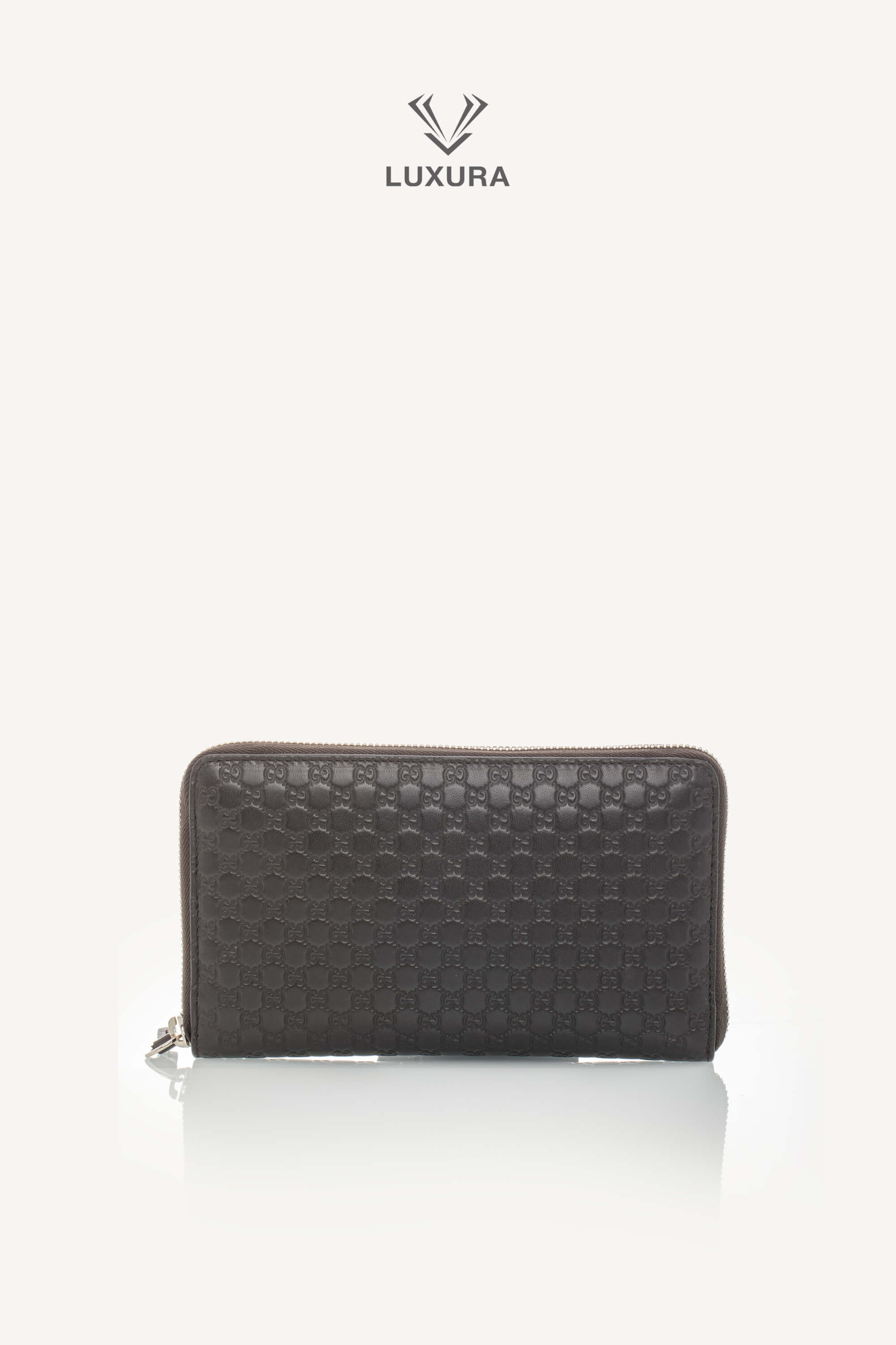<span style="font-size: 10px;letter-spacing: .15em">BEST DEAL</span><br> <strong>GUCCI</strong><br> <div style="margin-top:10px;font-size:16px">Microguccissima Large Zip Around Organizer Wallet Brown</div><br>