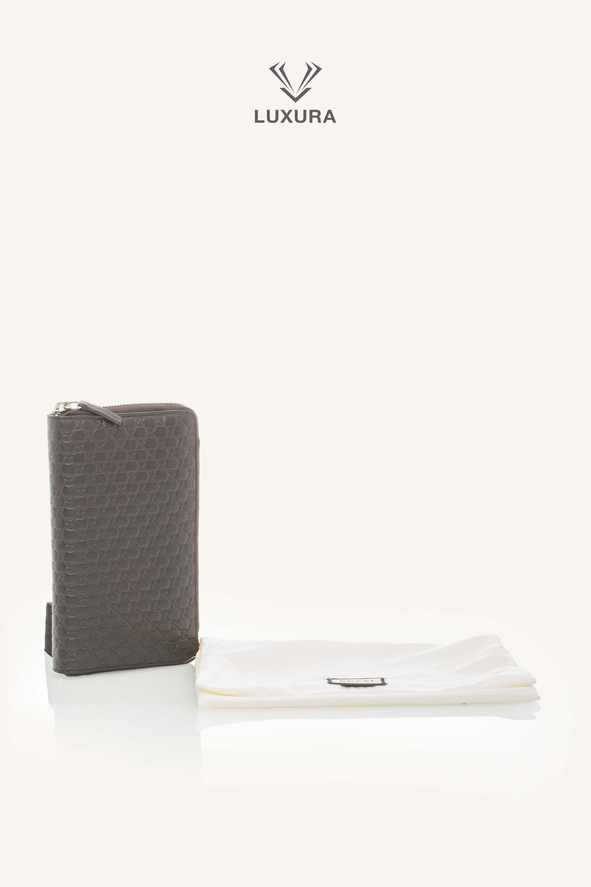 <span style="font-size: 10px;letter-spacing: .15em">BEST DEAL</span><br> <strong>GUCCI</strong><br> <div style="margin-top:10px;font-size:16px">Microguccissima Large Zip Around Organizer Wallet Brown</div><br> - Image 2