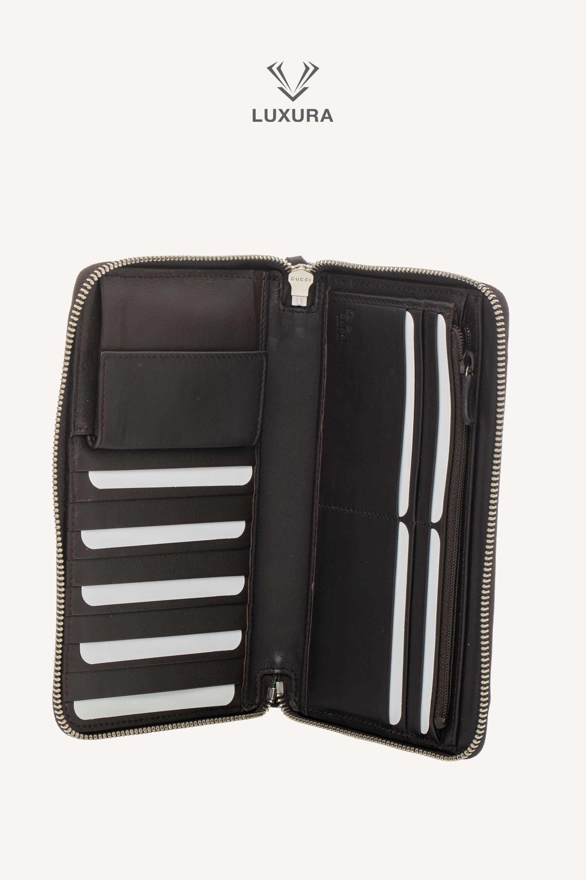 <span style="font-size: 10px;letter-spacing: .15em">BEST DEAL</span><br> <strong>GUCCI</strong><br> <div style="margin-top:10px;font-size:16px">Microguccissima Large Zip Around Organizer Wallet Brown</div><br> - Image 11