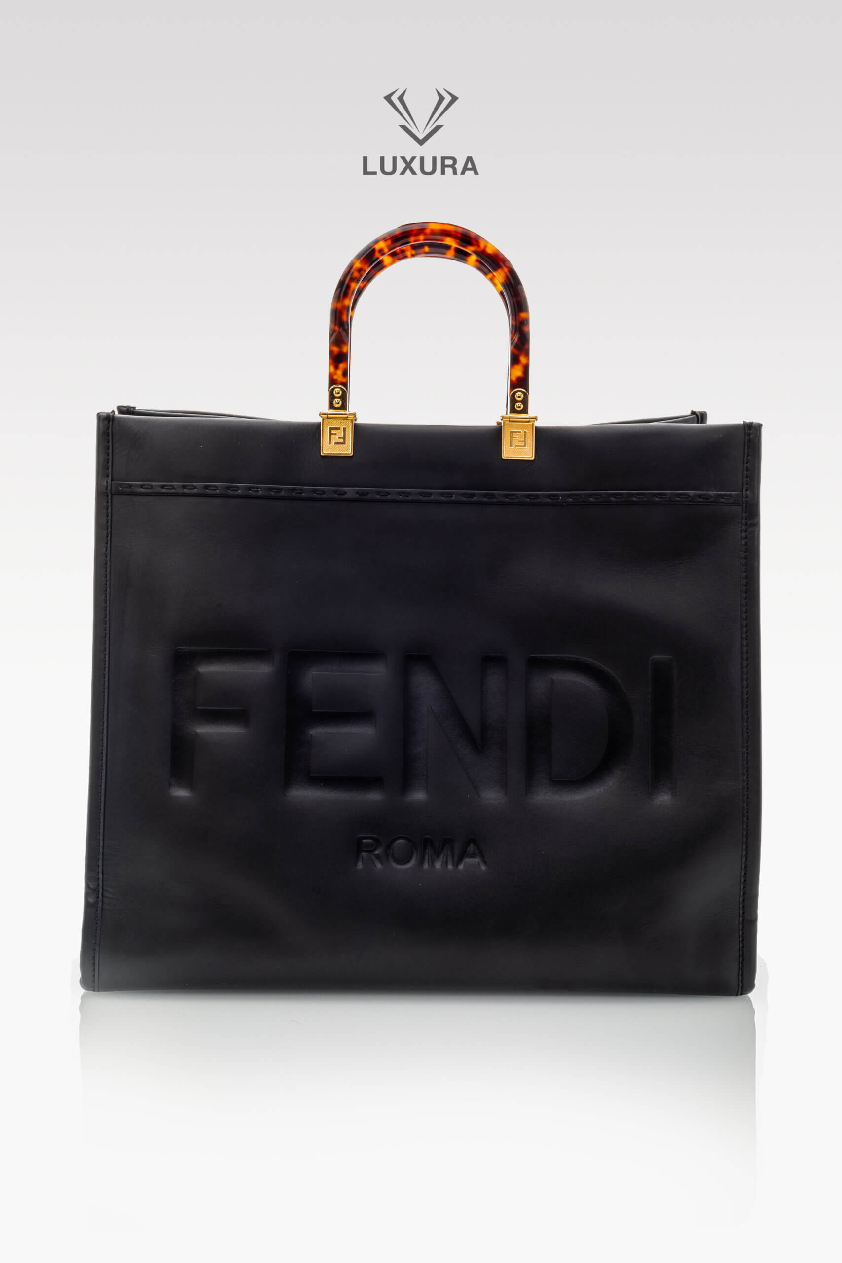<span style="font-size: 10px;letter-spacing: .15em">BEST DEAL</span><br>            <strong>FENDI</strong><br>            <div style="margin-top:10px;font-size:16px">Sunshine Large Black Leather Shopper</div><br> - Image 4