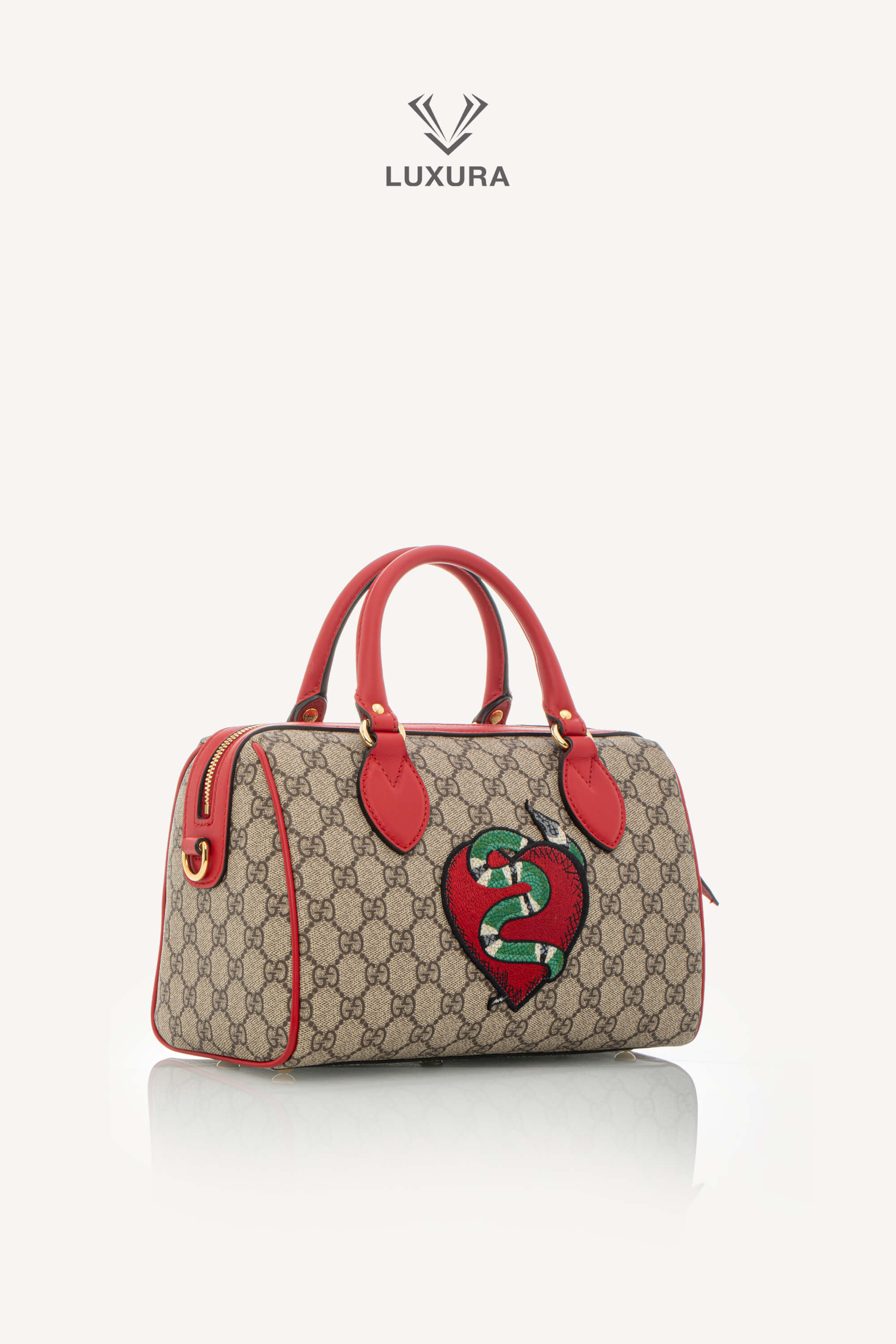 <span style="font-size: 10px;letter-spacing: .15em">BEST DEAL</span><br> <strong>GUCCI</strong><br> <div style="margin-top:10px;font-size:16px">GG Supreme Monogram Kingsnake Heart Embroidered Small Boston Red</div><br> - Image 3