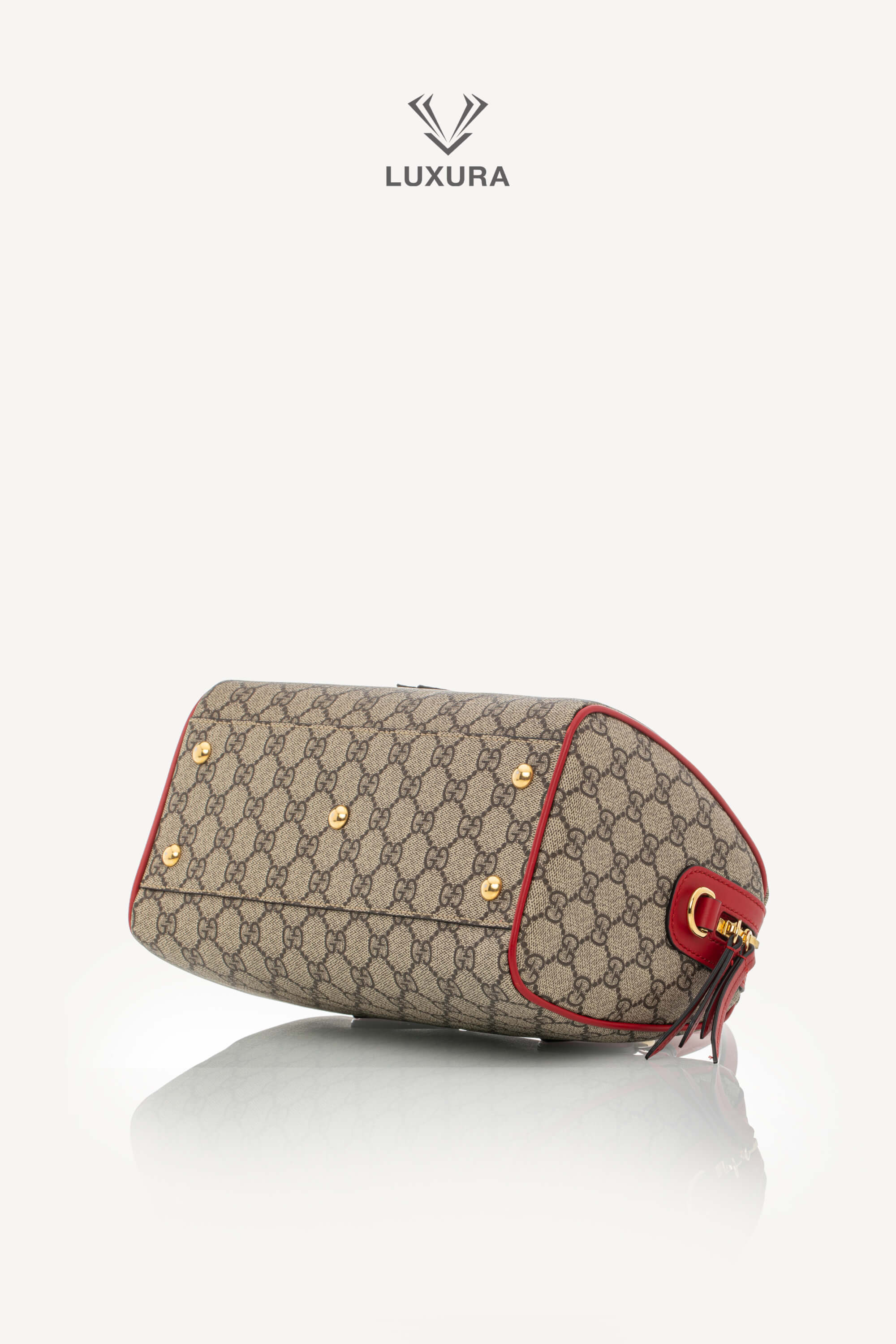 <span style="font-size: 10px;letter-spacing: .15em">BEST DEAL</span><br> <strong>GUCCI</strong><br> <div style="margin-top:10px;font-size:16px">GG Supreme Monogram Kingsnake Heart Embroidered Small Boston Red</div><br> - Image 22