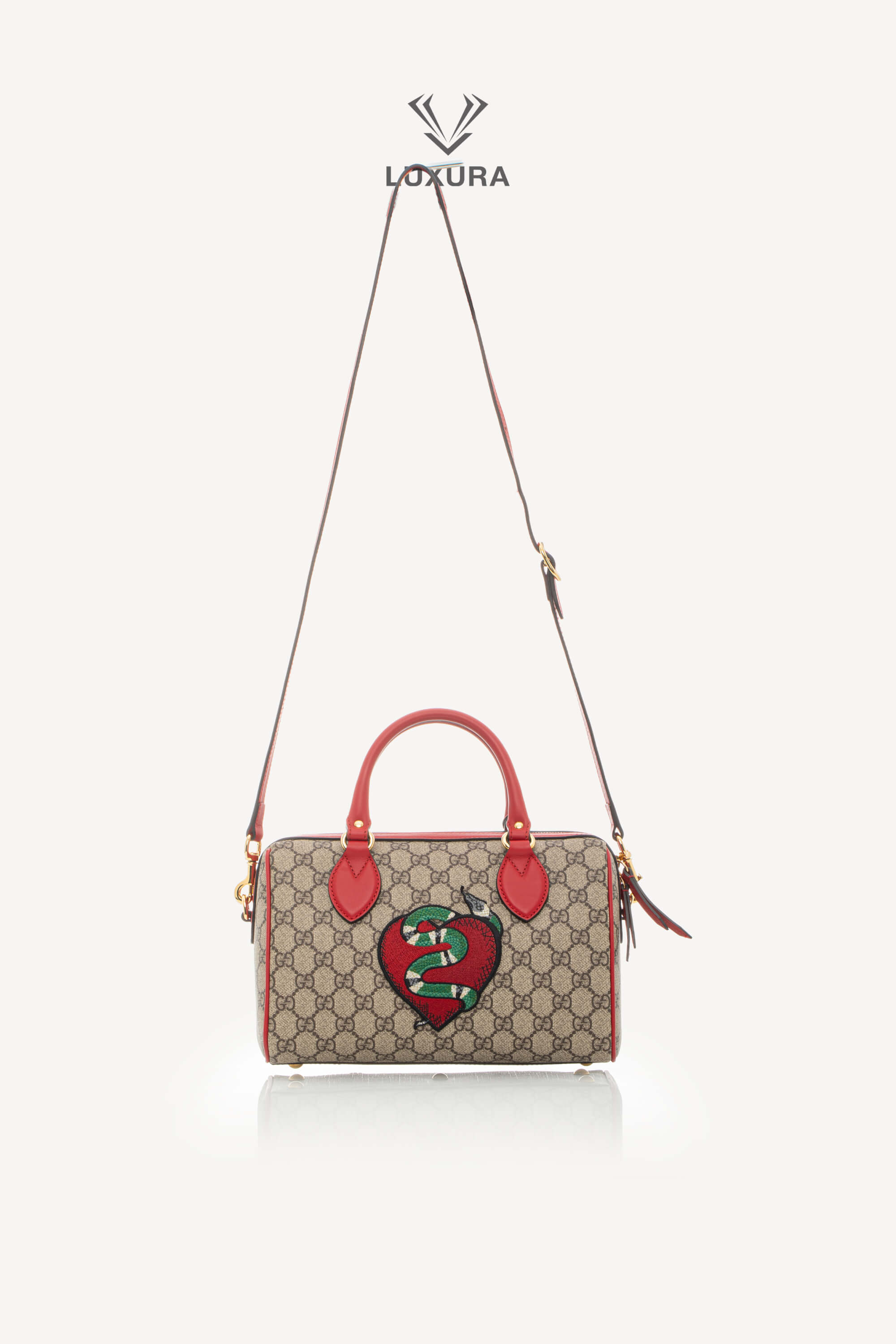 <span style="font-size: 10px;letter-spacing: .15em">BEST DEAL</span><br> <strong>GUCCI</strong><br> <div style="margin-top:10px;font-size:16px">GG Supreme Monogram Kingsnake Heart Embroidered Small Boston Red</div><br> - Image 4