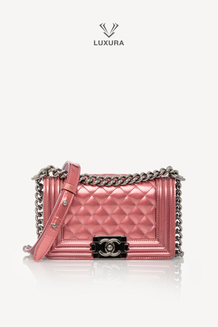 <span style="font-size: 10px;letter-spacing: .15em">HARD TO FIND</span><br>            <strong>CHANEL</strong><br>            <div style="margin-top:10px;font-size:16px">Leboy Small in Metallic Burgundy and Lavander Patent Calfskin Leather with Ruthenium Hardware</div><br>