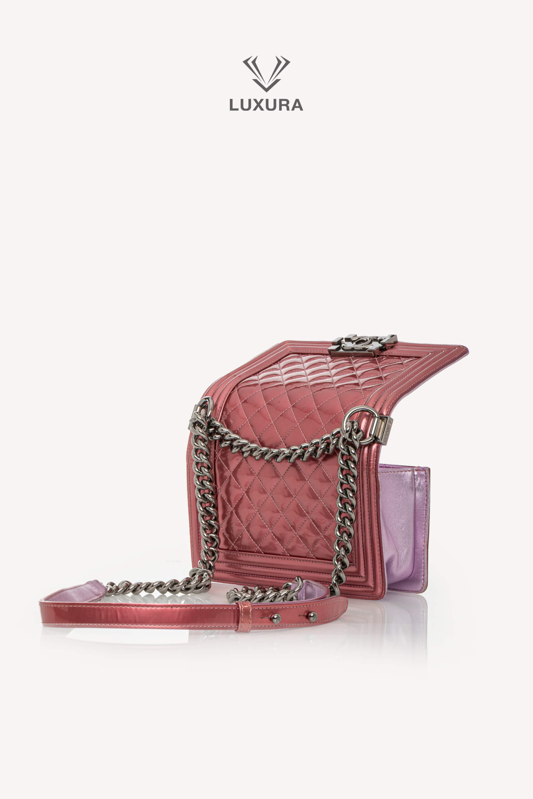<span style="font-size: 10px;letter-spacing: .15em">HARD TO FIND</span><br>            <strong>CHANEL</strong><br>            <div style="margin-top:10px;font-size:16px">Leboy Small in Metallic Burgundy and Lavander Patent Calfskin Leather with Ruthenium Hardware</div><br> - Image 13