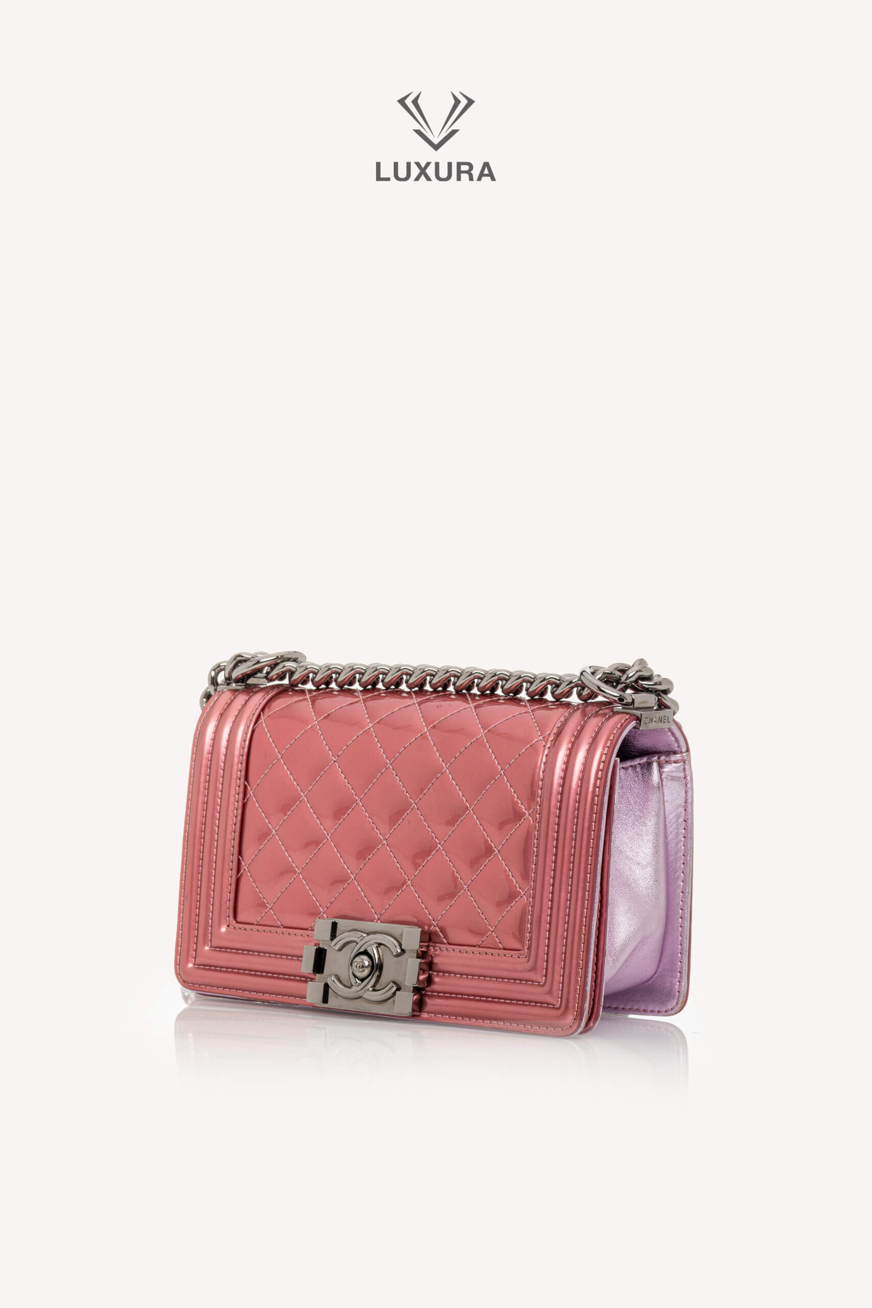 <span style="font-size: 10px;letter-spacing: .15em">HARD TO FIND</span><br>            <strong>CHANEL</strong><br>            <div style="margin-top:10px;font-size:16px">Leboy Small in Metallic Burgundy and Lavander Patent Calfskin Leather with Ruthenium Hardware</div><br> - Image 16