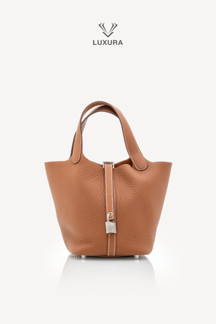 <span style="font-size: 10px;letter-spacing: .15em">HARD TO FIND</span><br>            <strong>HERMES</strong><br>            <div style="margin-top:10px;font-size:16px">Taurillon Clemence Picotin Lock 18 PM Gold Palladium Hardware</div><br>