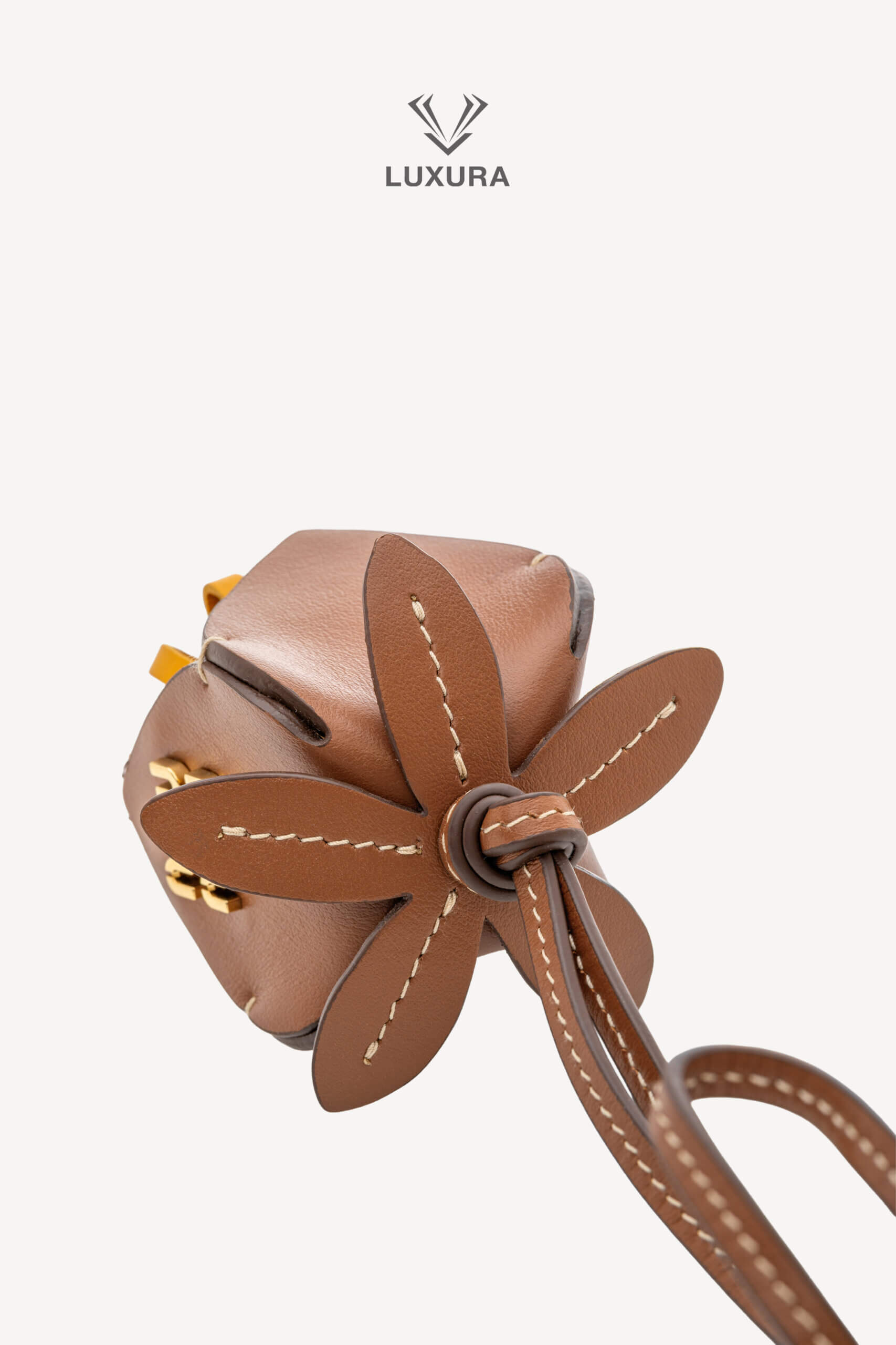 <span style="font-size: 10px;letter-spacing: .15em">HARD TO FIND</span><br>            <strong>MIU MIU</strong><br>            <div style="margin-top:10px;font-size:16px">Calfskin Trick Bag Charm Brown-Mustard Yellow</div><br> - Image 4