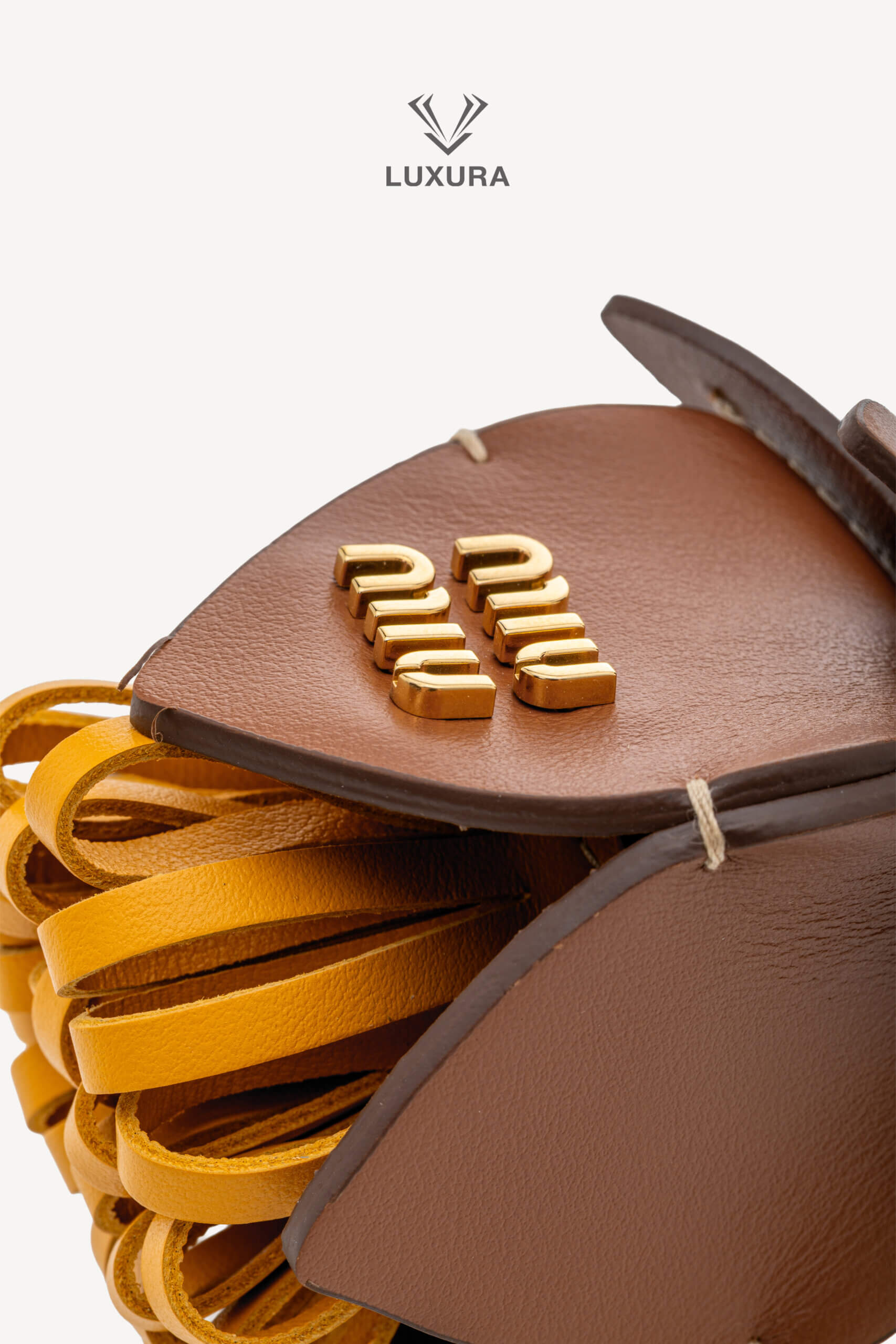 <span style="font-size: 10px;letter-spacing: .15em">HARD TO FIND</span><br>            <strong>MIU MIU</strong><br>            <div style="margin-top:10px;font-size:16px">Calfskin Trick Bag Charm Brown-Mustard Yellow</div><br> - Image 6