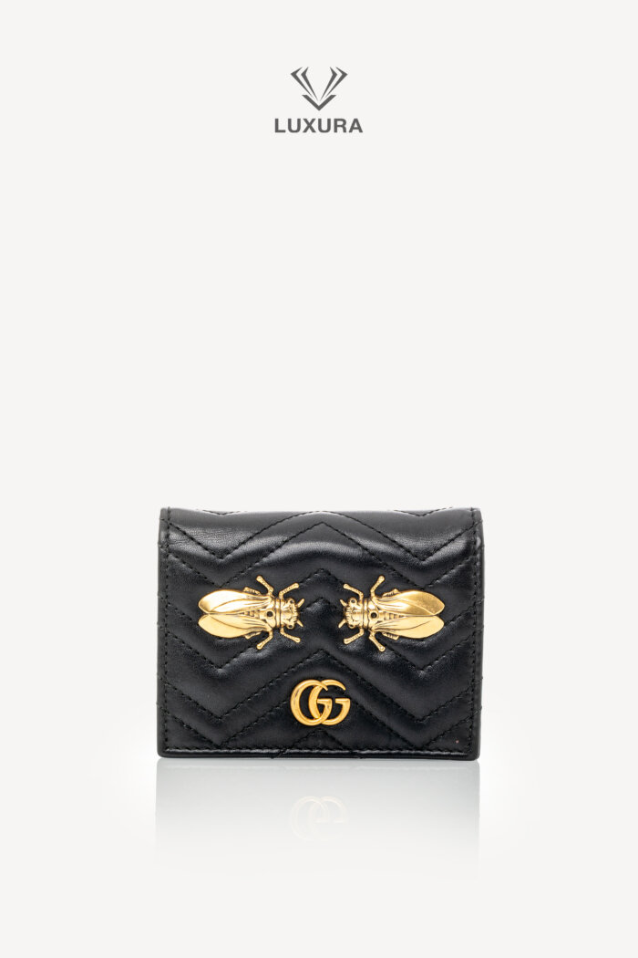 <span style="font-size: 10px;letter-spacing: .15em">HARD TO FIND</span><br>            <strong>GUCCI</strong><br>            <div style="margin-top:10px;font-size:16px">Leather Cicada GG Marmont Card Case Black</div><br>