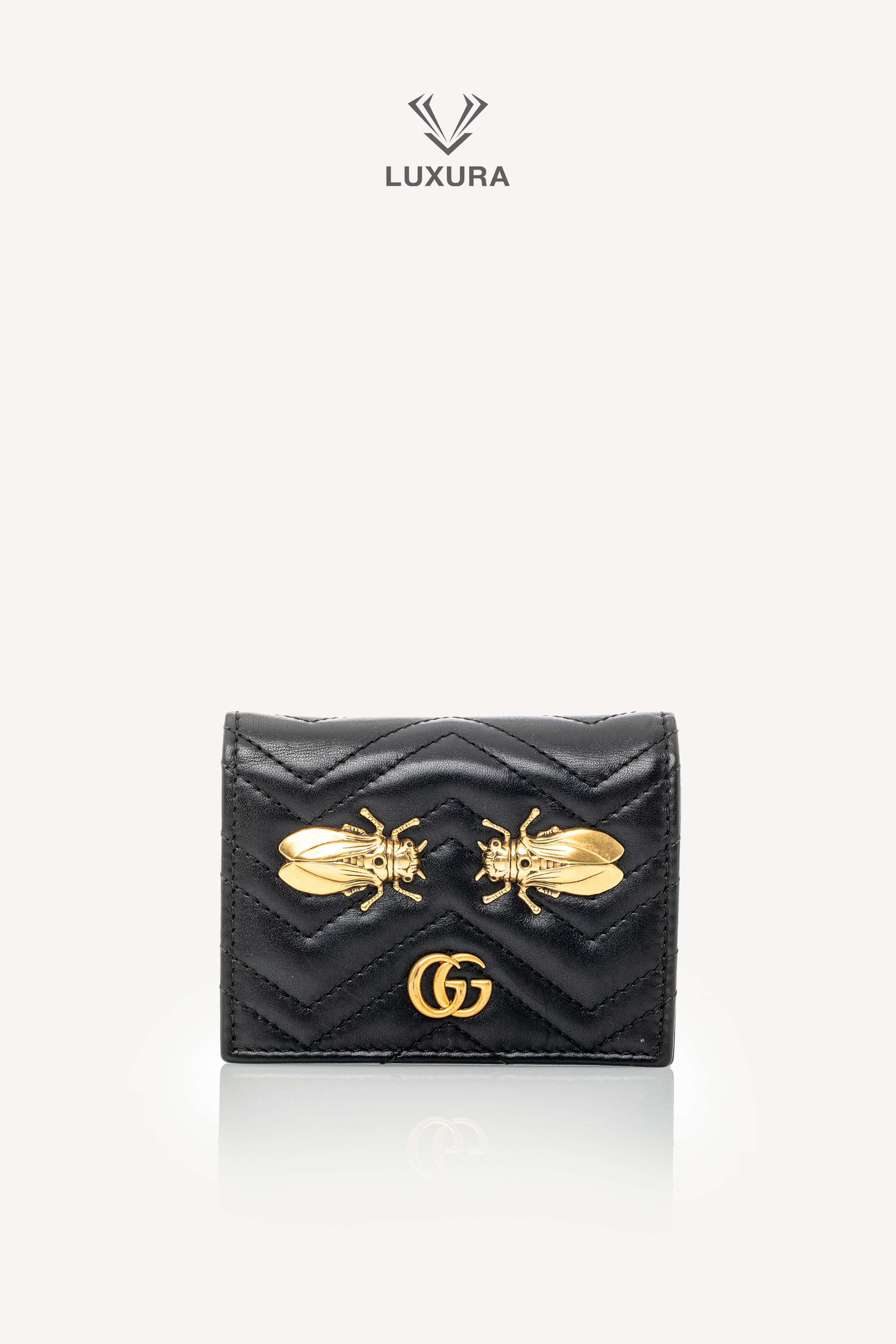 <span style="font-size: 10px;letter-spacing: .15em">HARD TO FIND</span><br> <strong>GUCCI</strong><br> <div style="margin-top:10px;font-size:16px">Leather Cicada GG Marmont Card Case Black</div><br>