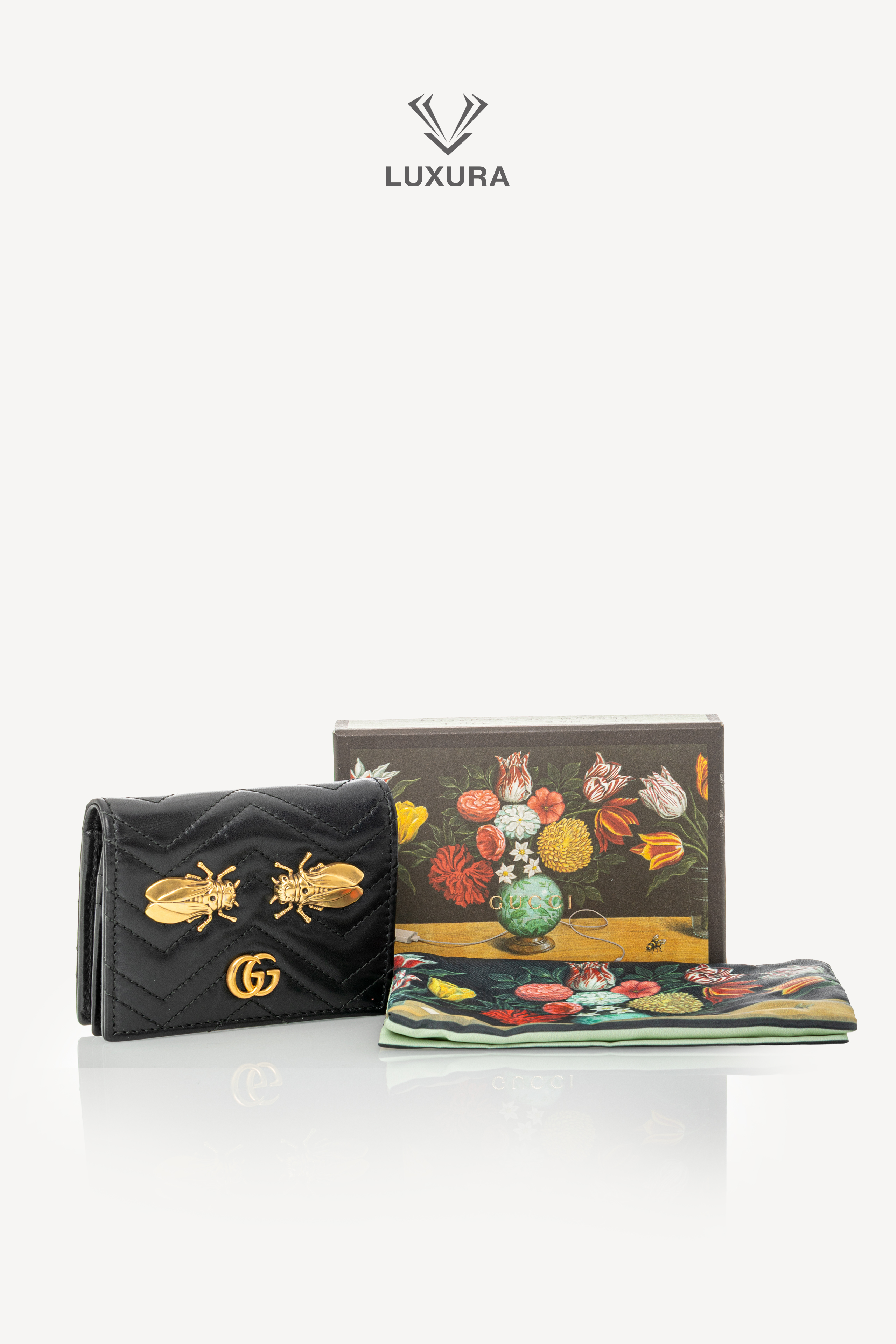 <span style="font-size: 10px;letter-spacing: .15em">HARD TO FIND</span><br> <strong>GUCCI</strong><br> <div style="margin-top:10px;font-size:16px">Leather Cicada GG Marmont Card Case Black</div><br> - Image 2