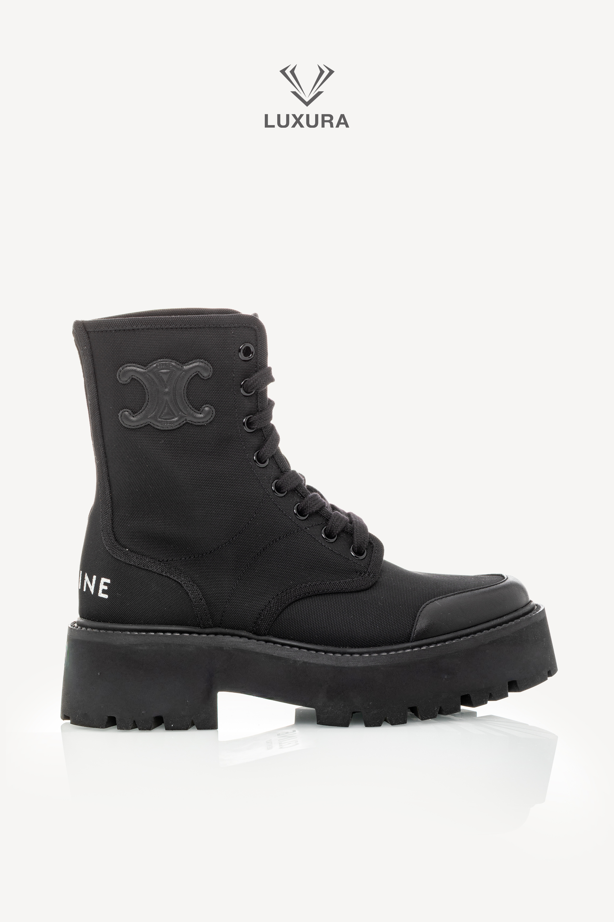 <span style="font-size: 10px;letter-spacing: .15em">NEW COLLECTION</span><br>            <strong>CELINE</strong><br>            <div style="margin-top:10px;font-size:16px">Bulky Laced Up Boot In Nylon And Shinny Bull Black 36 ( true size 36.5 )</div><br>