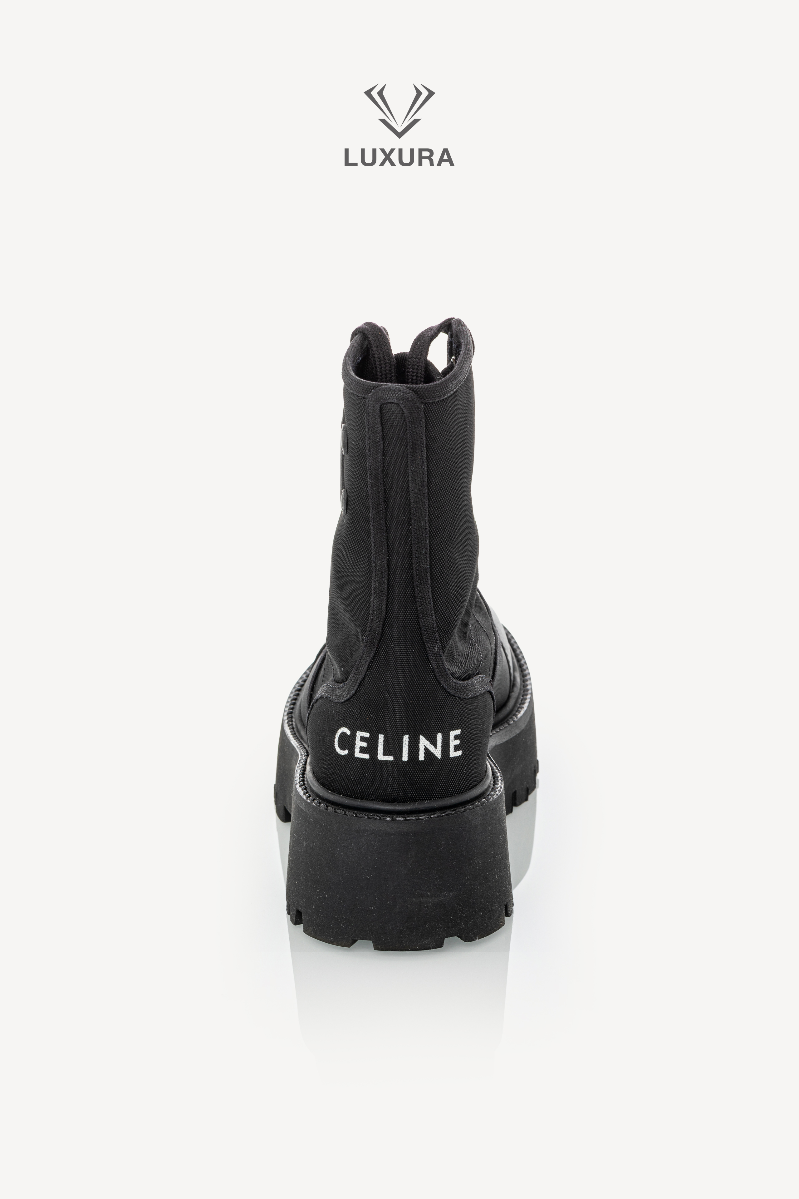 <span style="font-size: 10px;letter-spacing: .15em">NEW COLLECTION</span><br>            <strong>CELINE</strong><br>            <div style="margin-top:10px;font-size:16px">Bulky Laced Up Boot In Nylon And Shinny Bull Black 36 ( true size 36.5 )</div><br> - Image 9