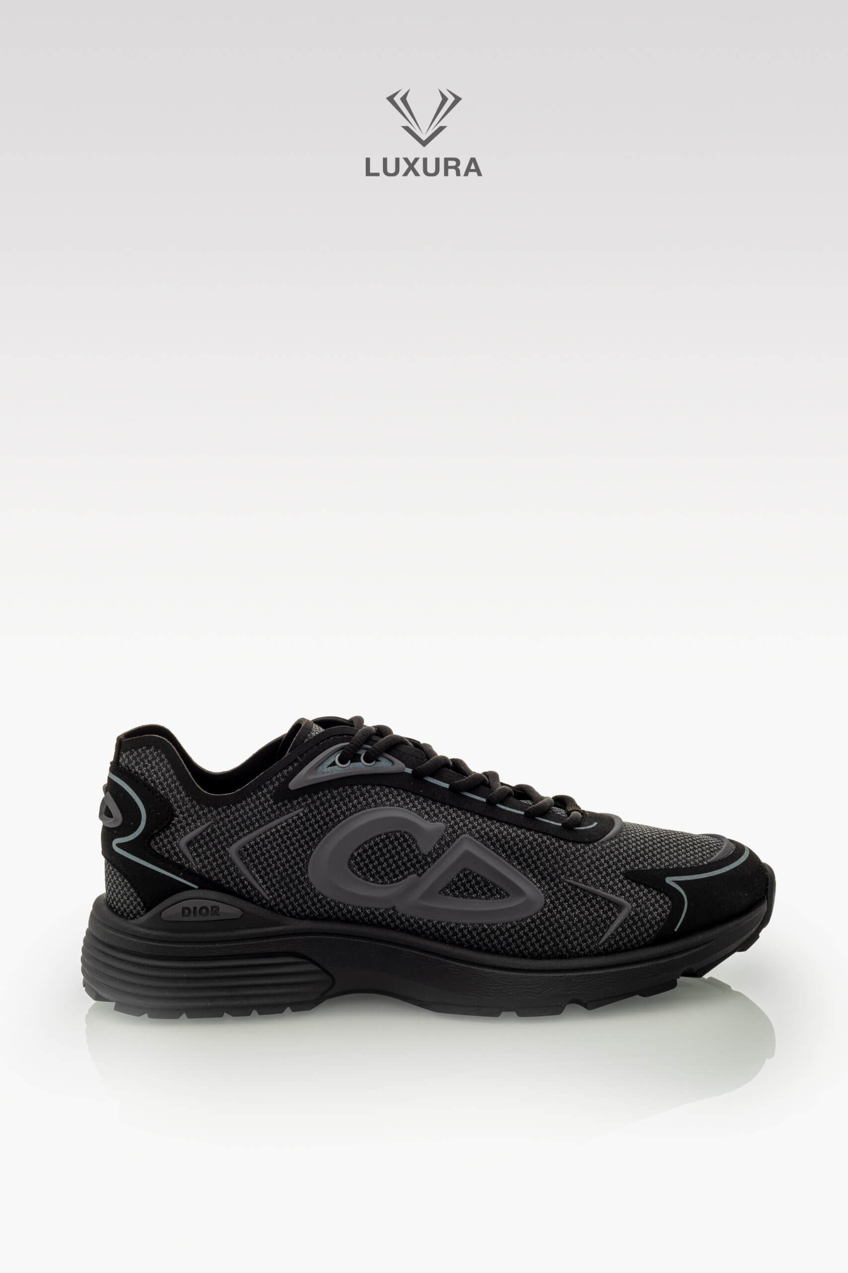 <span style="font-size: 10px;letter-spacing: .15em">NEW COLLECTION</span><br>            <strong>DIOR</strong><br>            <div style="margin-top:10px;font-size:16px">B30 Countdown Tech Sneaker Black Semi-Transparent N30 Nylon Black Gray 42 </div><br>