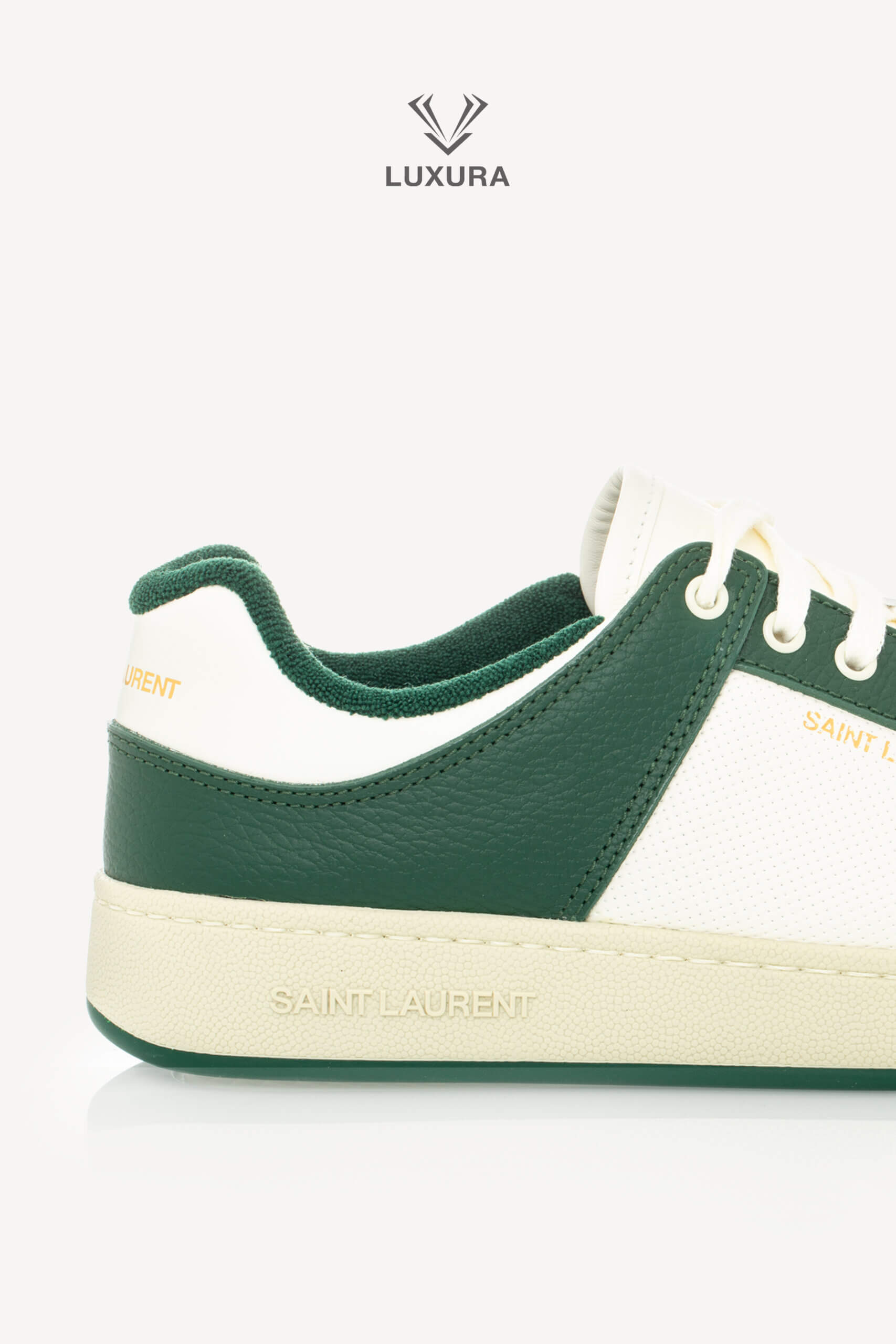 <span style="font-size: 10px;letter-spacing: .15em">BEST DEAL</span><br>            <strong>SAINT LAURENT</strong><br>            <div style="margin-top:10px;font-size:16px">SL/61 Sneakers in Smooth Leather White-Green 43.5</div><br> - Image 10