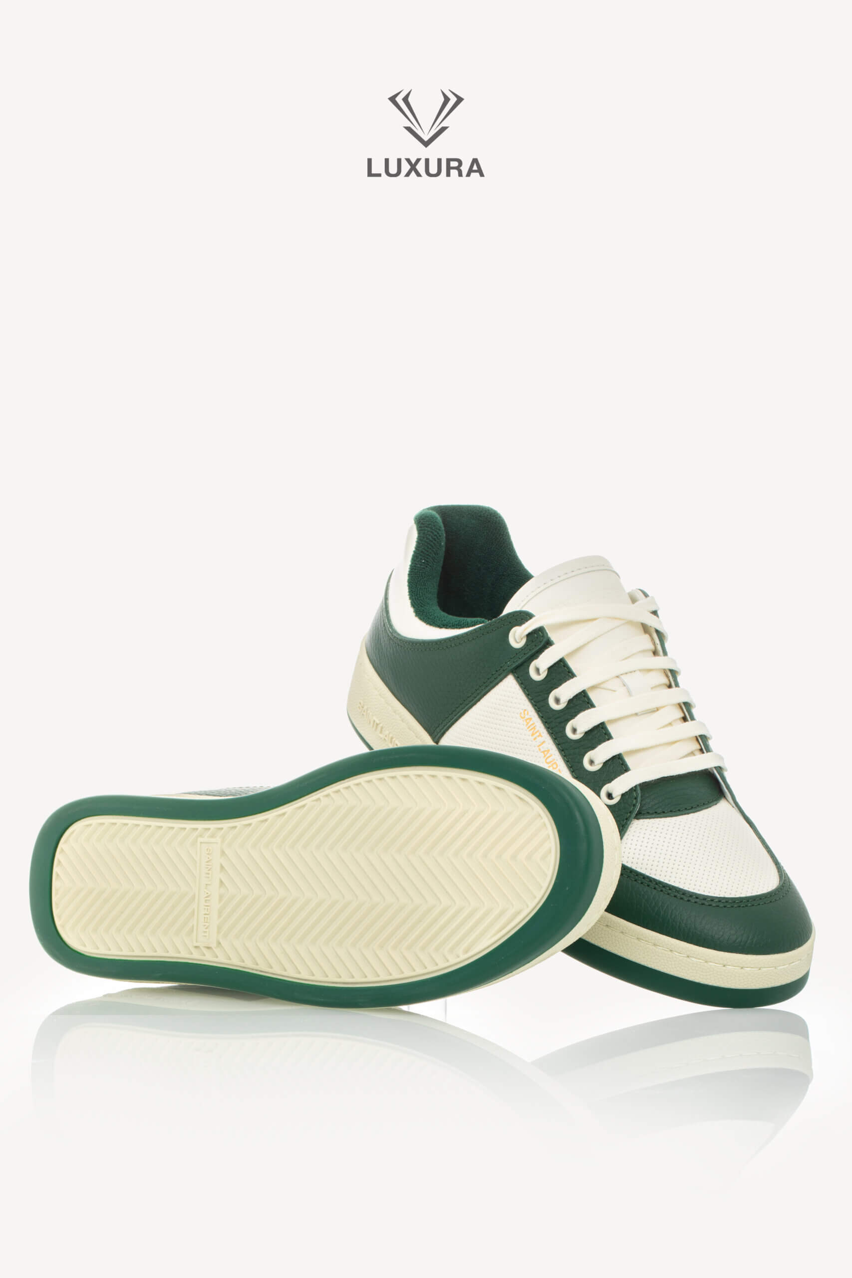 <span style="font-size: 10px;letter-spacing: .15em">BEST DEAL</span><br>            <strong>SAINT LAURENT</strong><br>            <div style="margin-top:10px;font-size:16px">SL/61 Sneakers in Smooth Leather White-Green 43.5</div><br> - Image 27