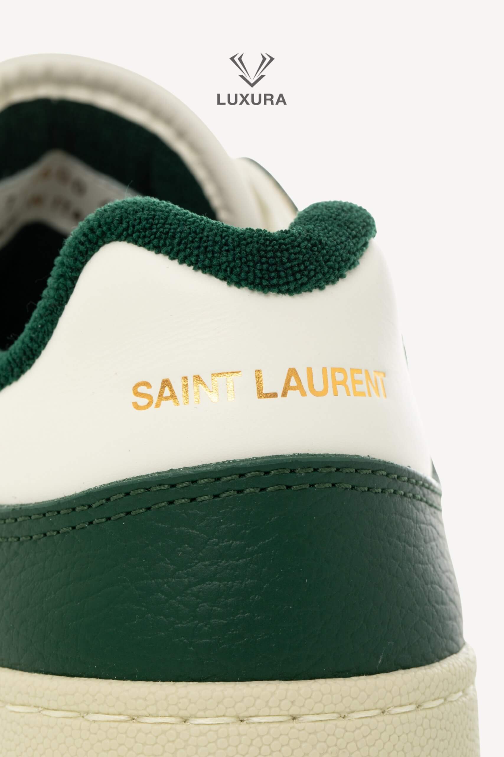 <span style="font-size: 10px;letter-spacing: .15em">BEST DEAL</span><br>            <strong>SAINT LAURENT</strong><br>            <div style="margin-top:10px;font-size:16px">SL/61 Sneakers in Smooth Leather White-Green 43.5</div><br> - Image 18