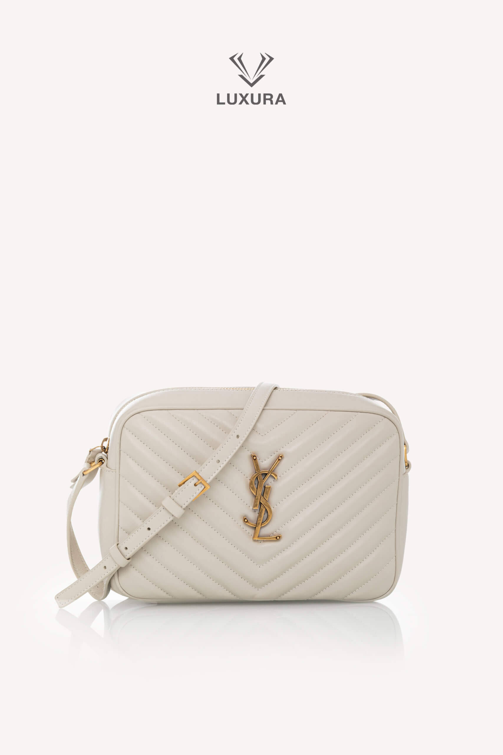 <span style="font-size: 10px;letter-spacing: .15em">HARD TO FIND</span><br>
            <strong>SAINT LAURENT</strong><br>
            <div style="margin-top:10px;font-size:16px">Lou Camera Bag In Quilted Leather White</div><br>