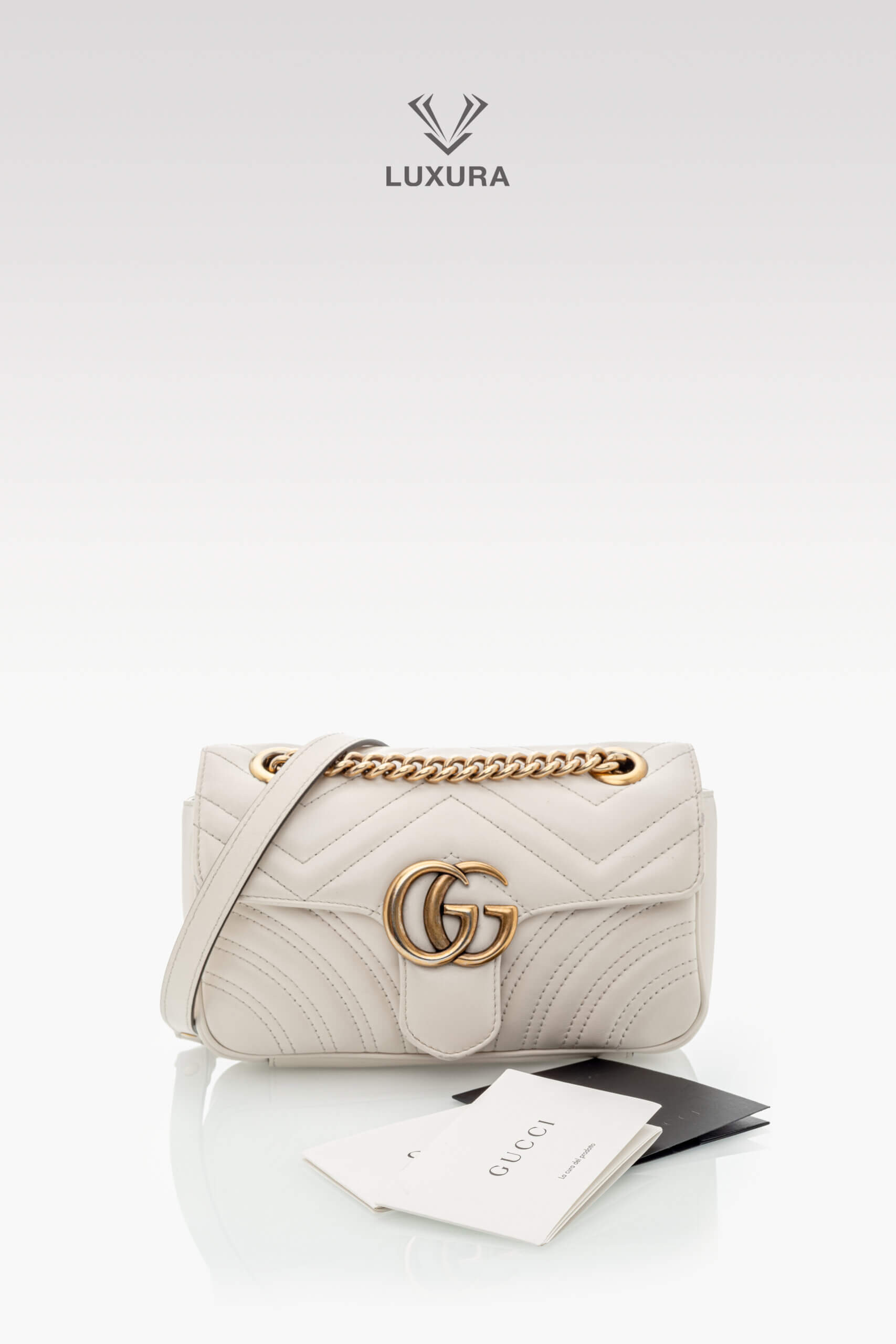 <span style="font-size: 10px;letter-spacing: .15em">BEST DEAL</span><br>            <strong>GUCCI</strong><br>            <div style="margin-top:10px;font-size:16px">Calfskin Matelasse Mini GG Marmont Shoulder Bag White</div><br> - Image 2