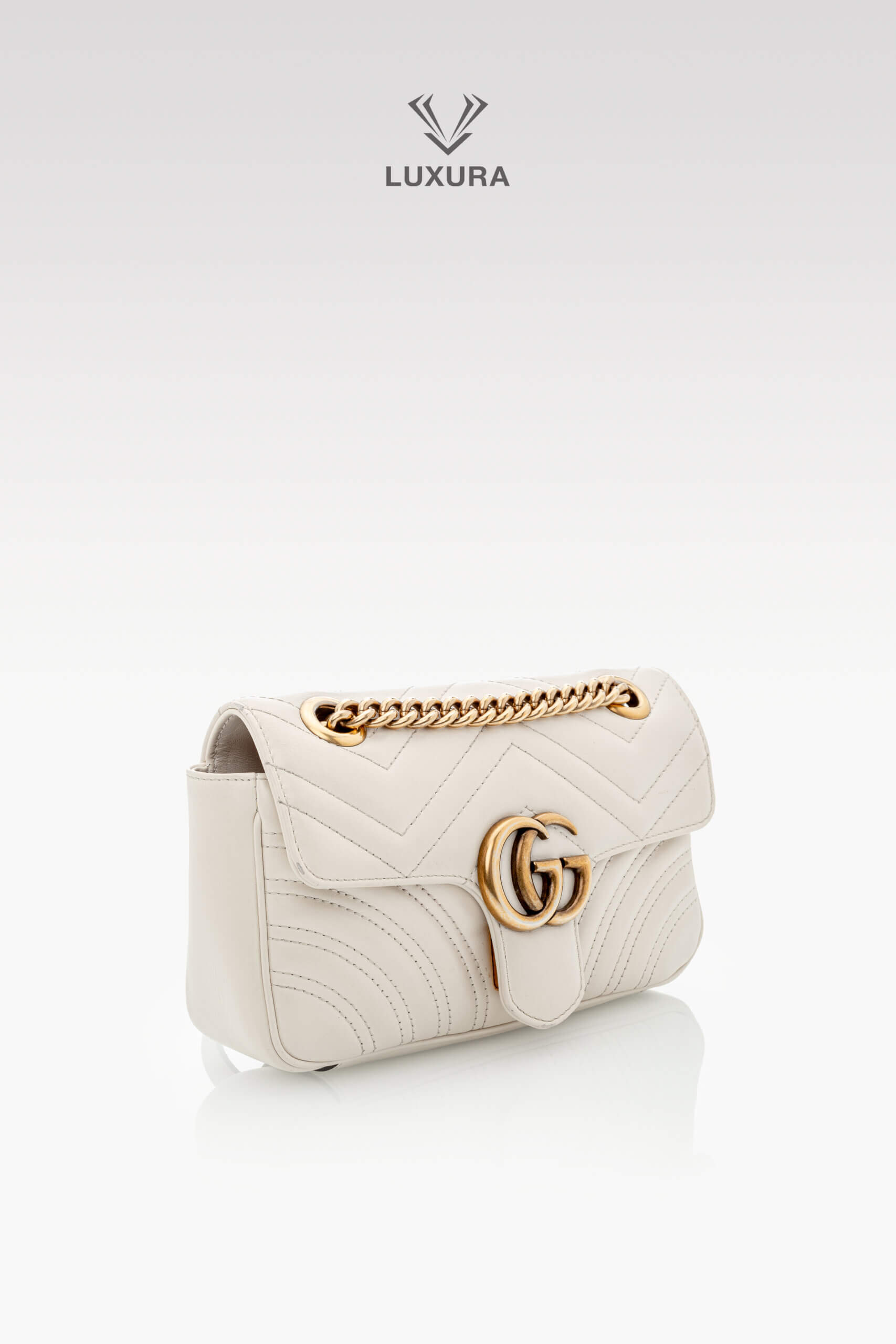 <span style="font-size: 10px;letter-spacing: .15em">BEST DEAL</span><br>            <strong>GUCCI</strong><br>            <div style="margin-top:10px;font-size:16px">Calfskin Matelasse Mini GG Marmont Shoulder Bag White</div><br> - Image 3