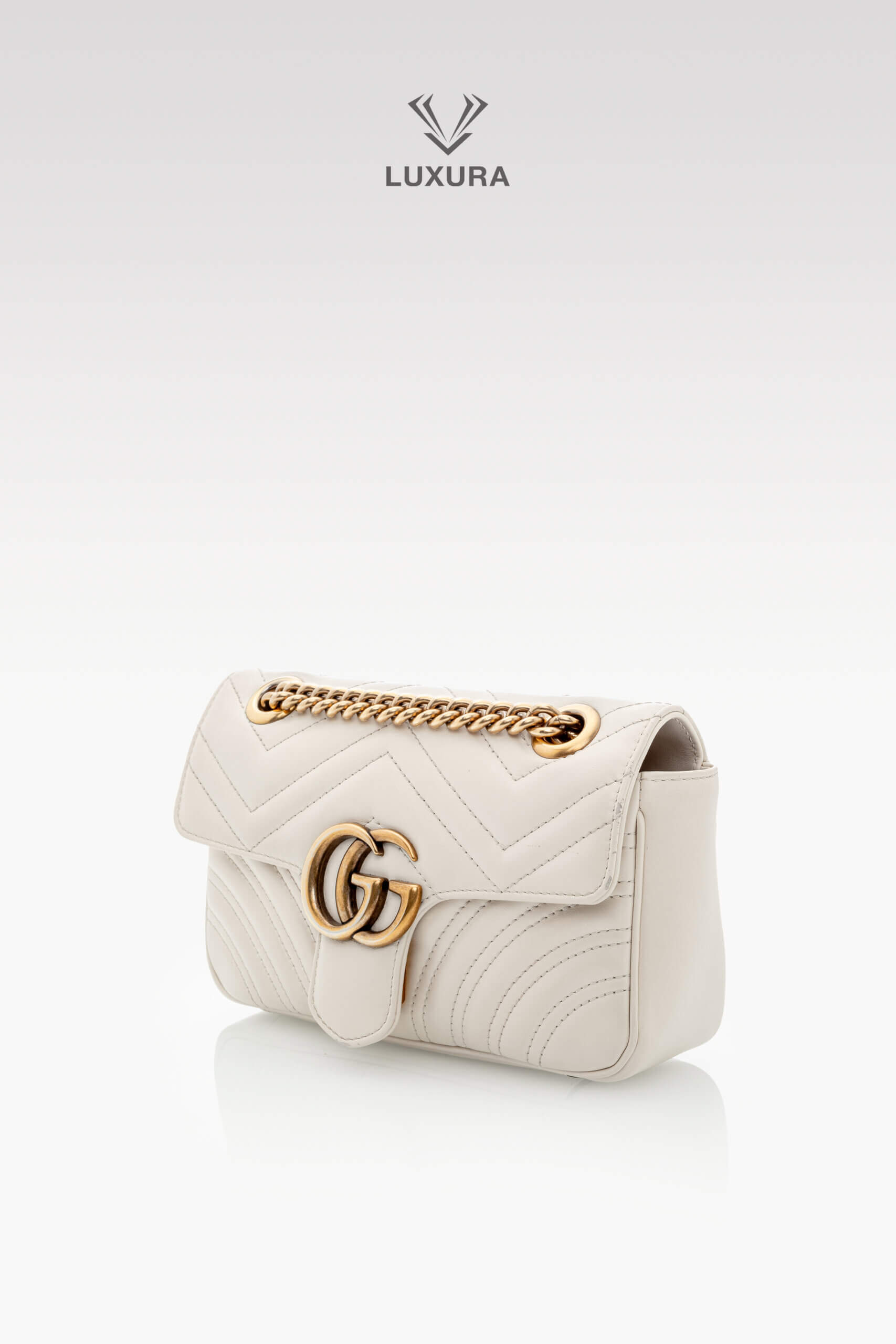 <span style="font-size: 10px;letter-spacing: .15em">BEST DEAL</span><br>            <strong>GUCCI</strong><br>            <div style="margin-top:10px;font-size:16px">Calfskin Matelasse Mini GG Marmont Shoulder Bag White</div><br> - Image 8