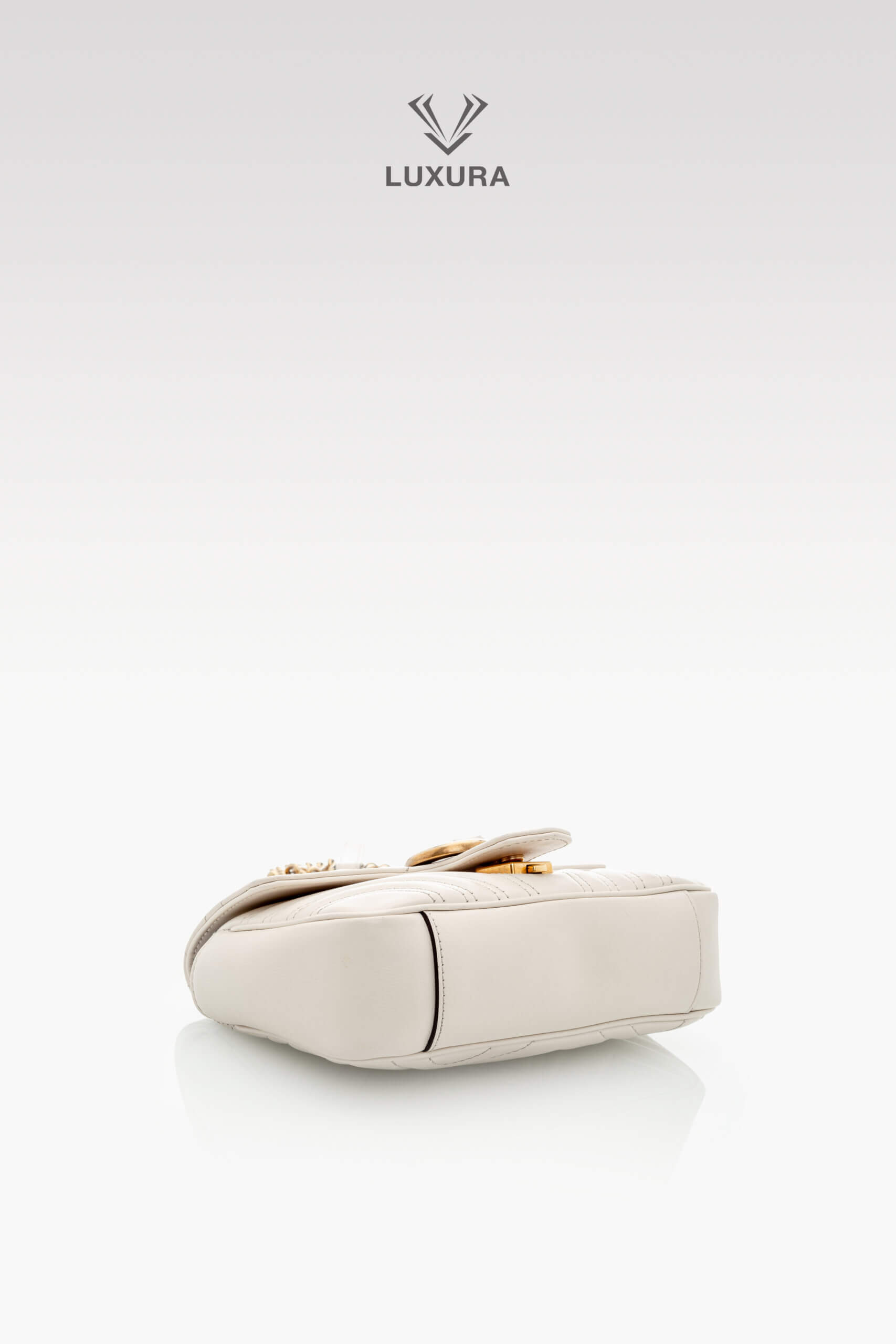 <span style="font-size: 10px;letter-spacing: .15em">BEST DEAL</span><br>            <strong>GUCCI</strong><br>            <div style="margin-top:10px;font-size:16px">Calfskin Matelasse Mini GG Marmont Shoulder Bag White</div><br> - Image 17