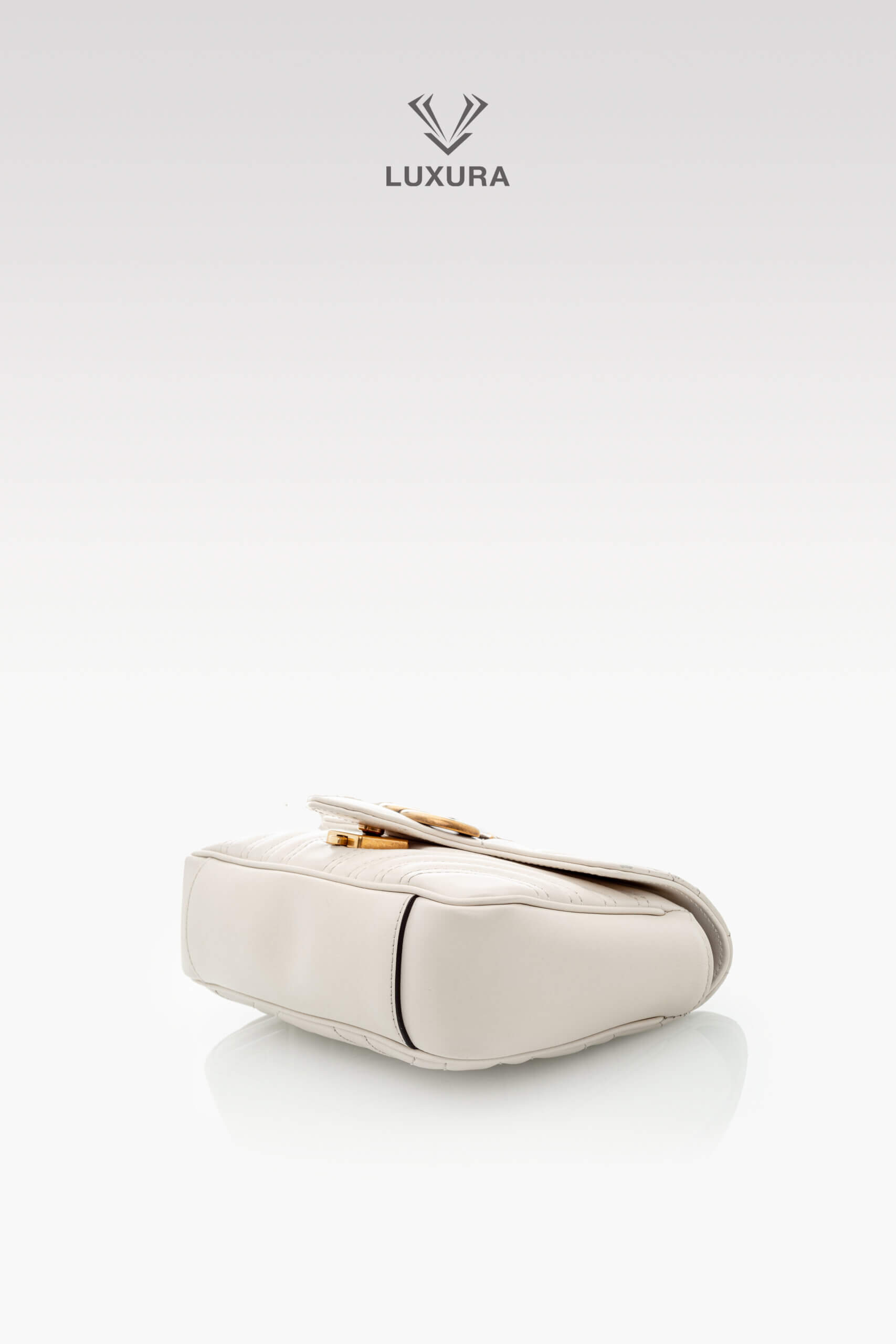 <span style="font-size: 10px;letter-spacing: .15em">BEST DEAL</span><br>            <strong>GUCCI</strong><br>            <div style="margin-top:10px;font-size:16px">Calfskin Matelasse Mini GG Marmont Shoulder Bag White</div><br> - Image 19