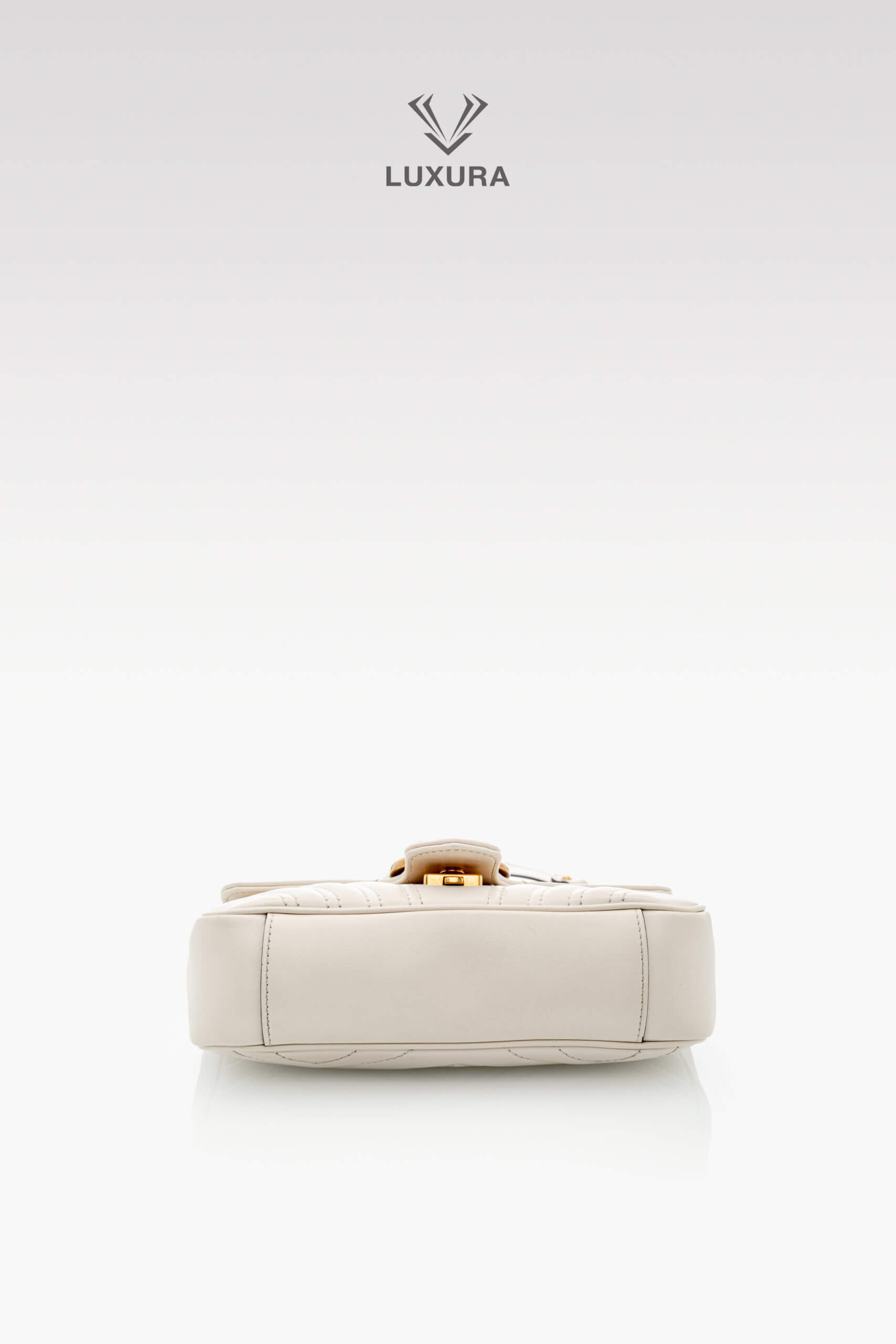 <span style="font-size: 10px;letter-spacing: .15em">BEST DEAL</span><br>            <strong>GUCCI</strong><br>            <div style="margin-top:10px;font-size:16px">Calfskin Matelasse Mini GG Marmont Shoulder Bag White</div><br> - Image 18