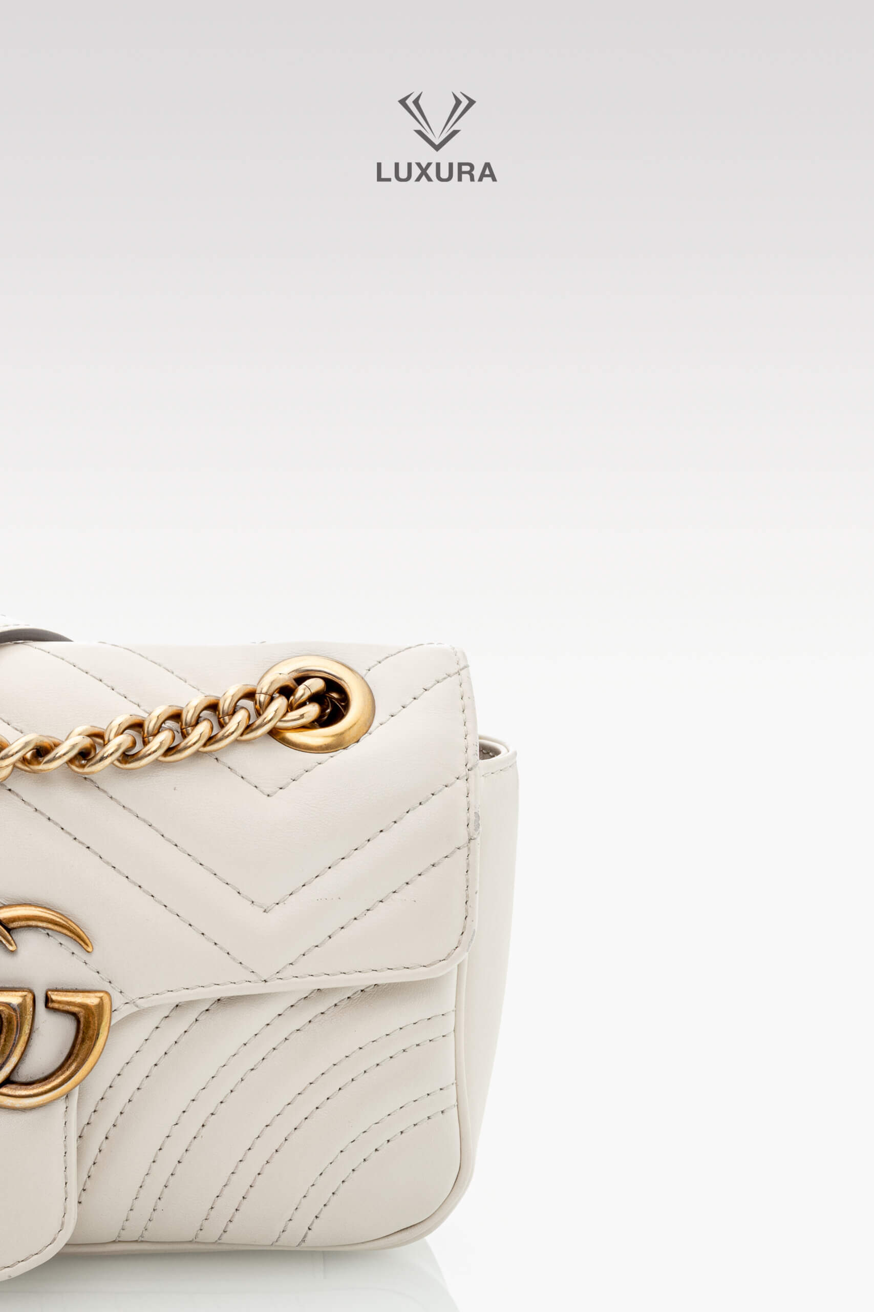 <span style="font-size: 10px;letter-spacing: .15em">BEST DEAL</span><br>            <strong>GUCCI</strong><br>            <div style="margin-top:10px;font-size:16px">Calfskin Matelasse Mini GG Marmont Shoulder Bag White</div><br> - Image 10