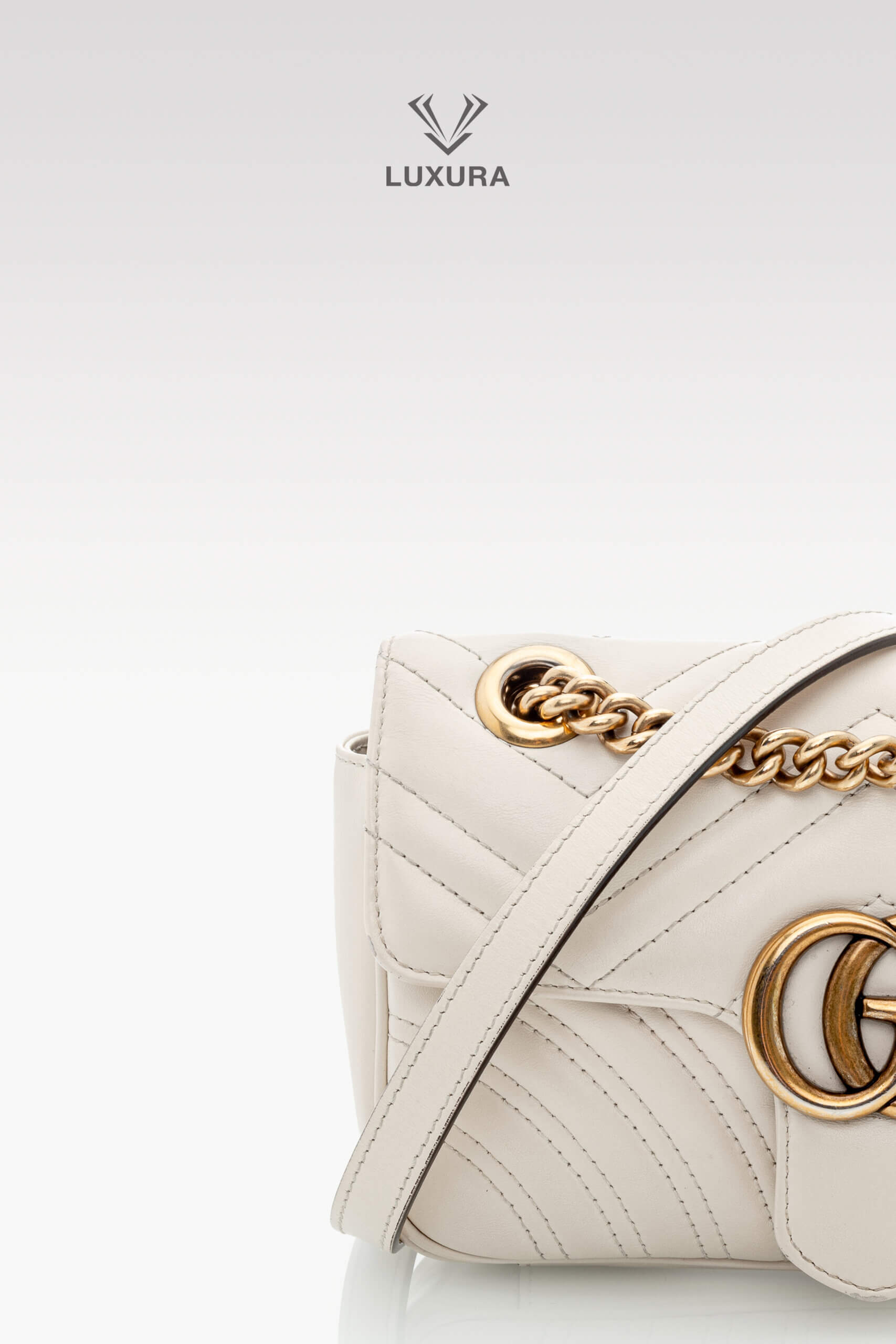 <span style="font-size: 10px;letter-spacing: .15em">BEST DEAL</span><br>            <strong>GUCCI</strong><br>            <div style="margin-top:10px;font-size:16px">Calfskin Matelasse Mini GG Marmont Shoulder Bag White</div><br> - Image 9