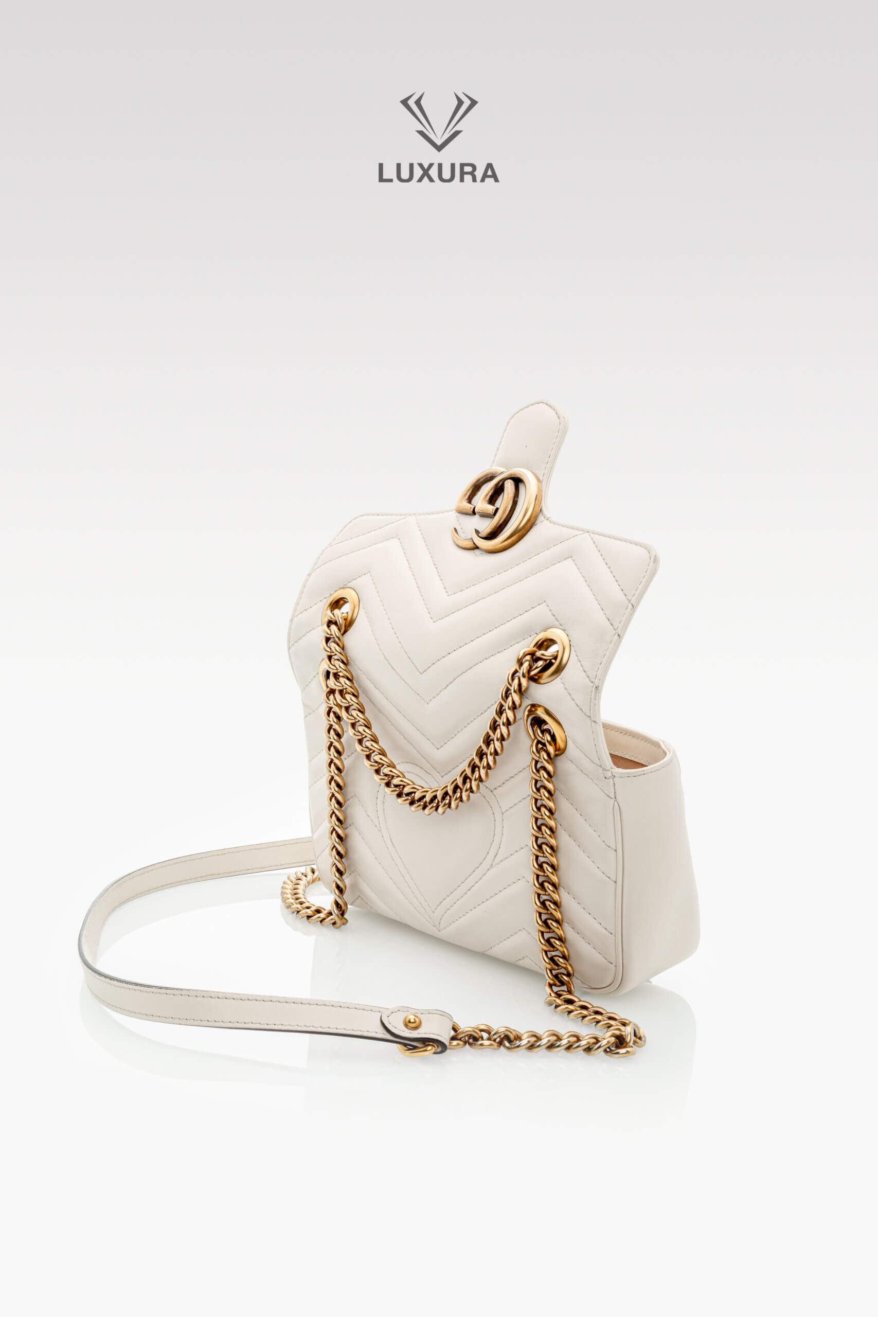 <span style="font-size: 10px;letter-spacing: .15em">BEST DEAL</span><br>            <strong>GUCCI</strong><br>            <div style="margin-top:10px;font-size:16px">Calfskin Matelasse Mini GG Marmont Shoulder Bag White</div><br> - Image 6
