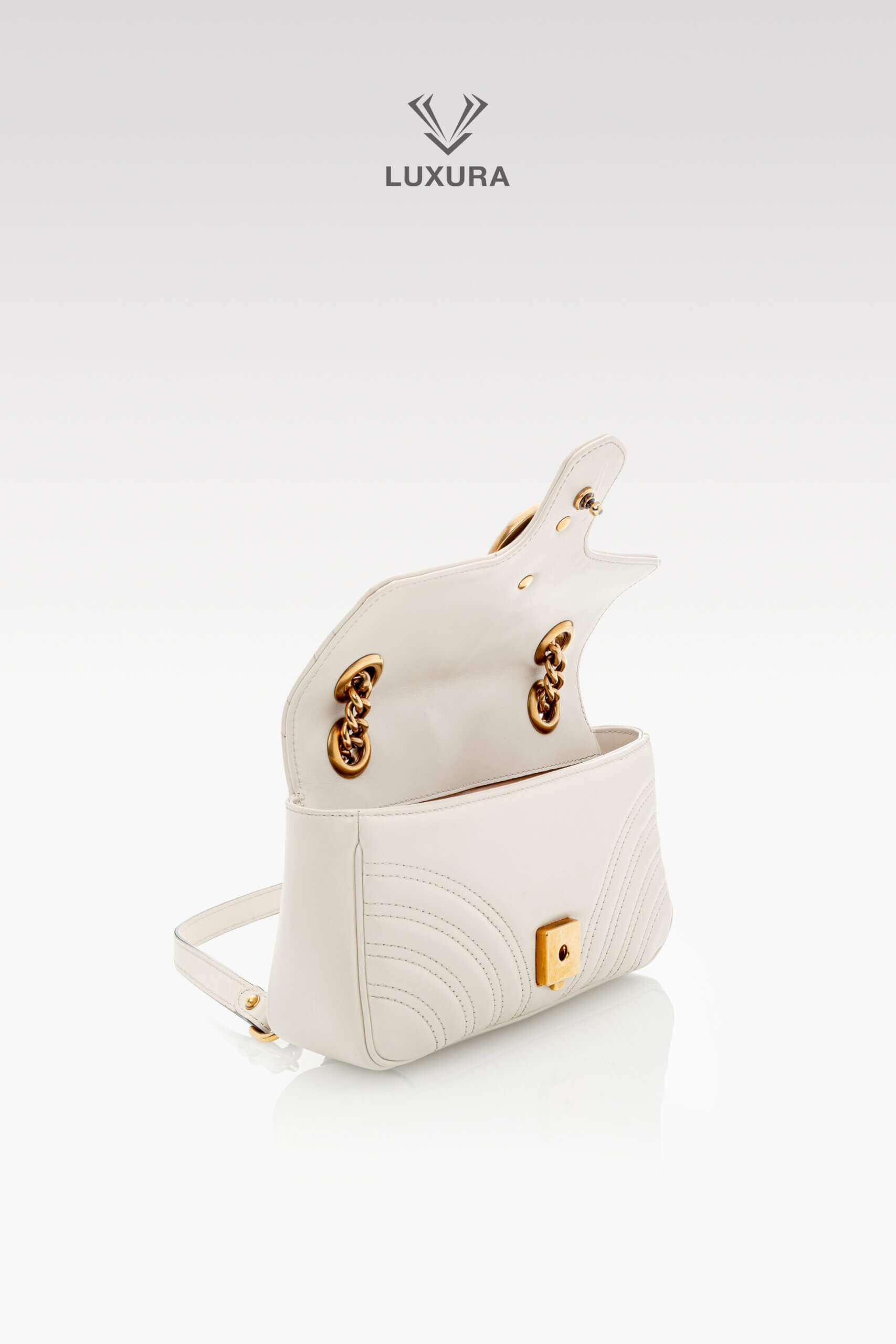 <span style="font-size: 10px;letter-spacing: .15em">BEST DEAL</span><br>            <strong>GUCCI</strong><br>            <div style="margin-top:10px;font-size:16px">Calfskin Matelasse Mini GG Marmont Shoulder Bag White</div><br> - Image 7