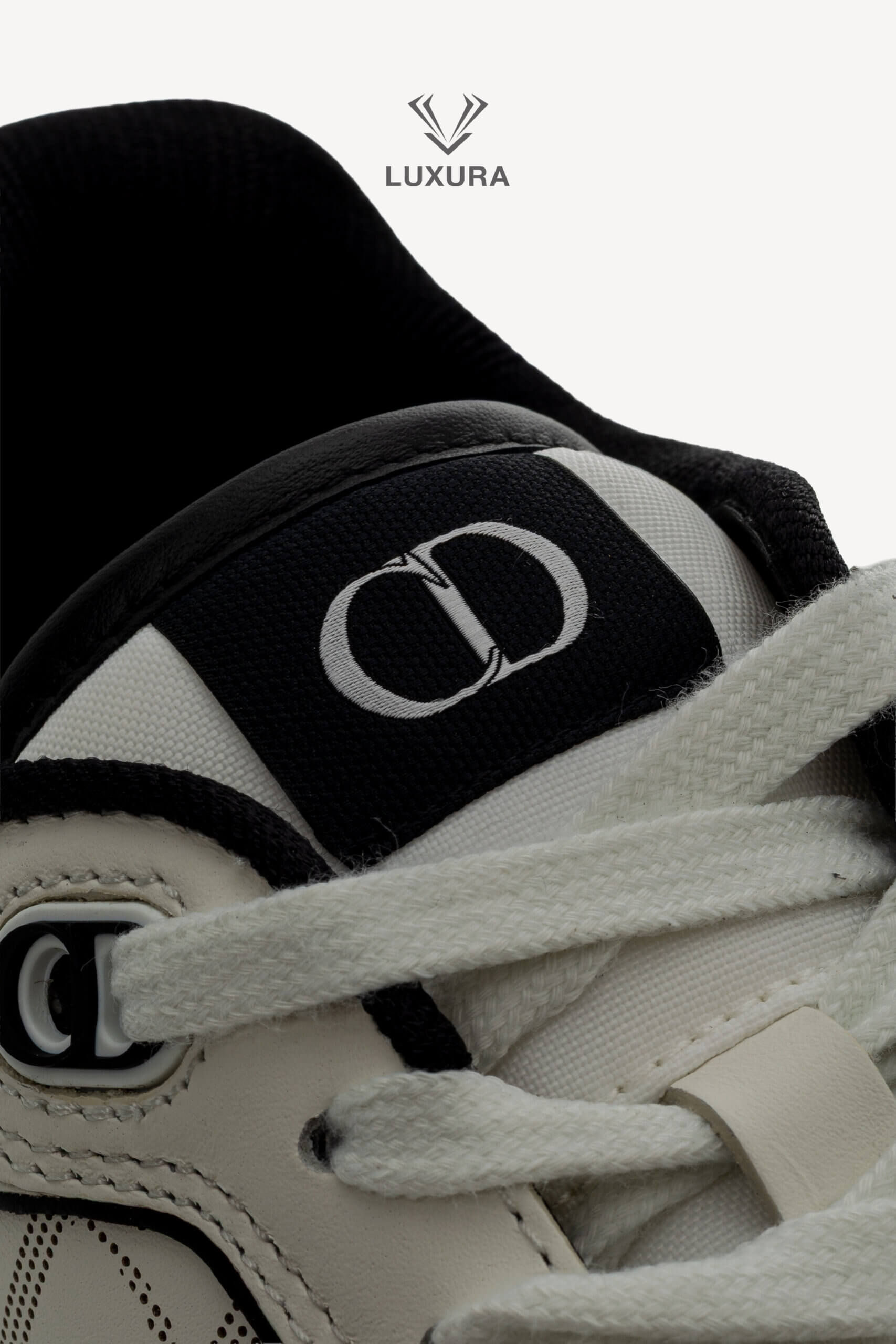 <span style="font-size: 10px;letter-spacing: .15em">NEW COLLECTION</span><br>            <strong>DIOR</strong><br>            <div style="margin-top:10px;font-size:16px">B27 Uptown Low-Top Sneaker White Black with White Dior Oblique Galaxy Leather 41 </div><br> - Image 13
