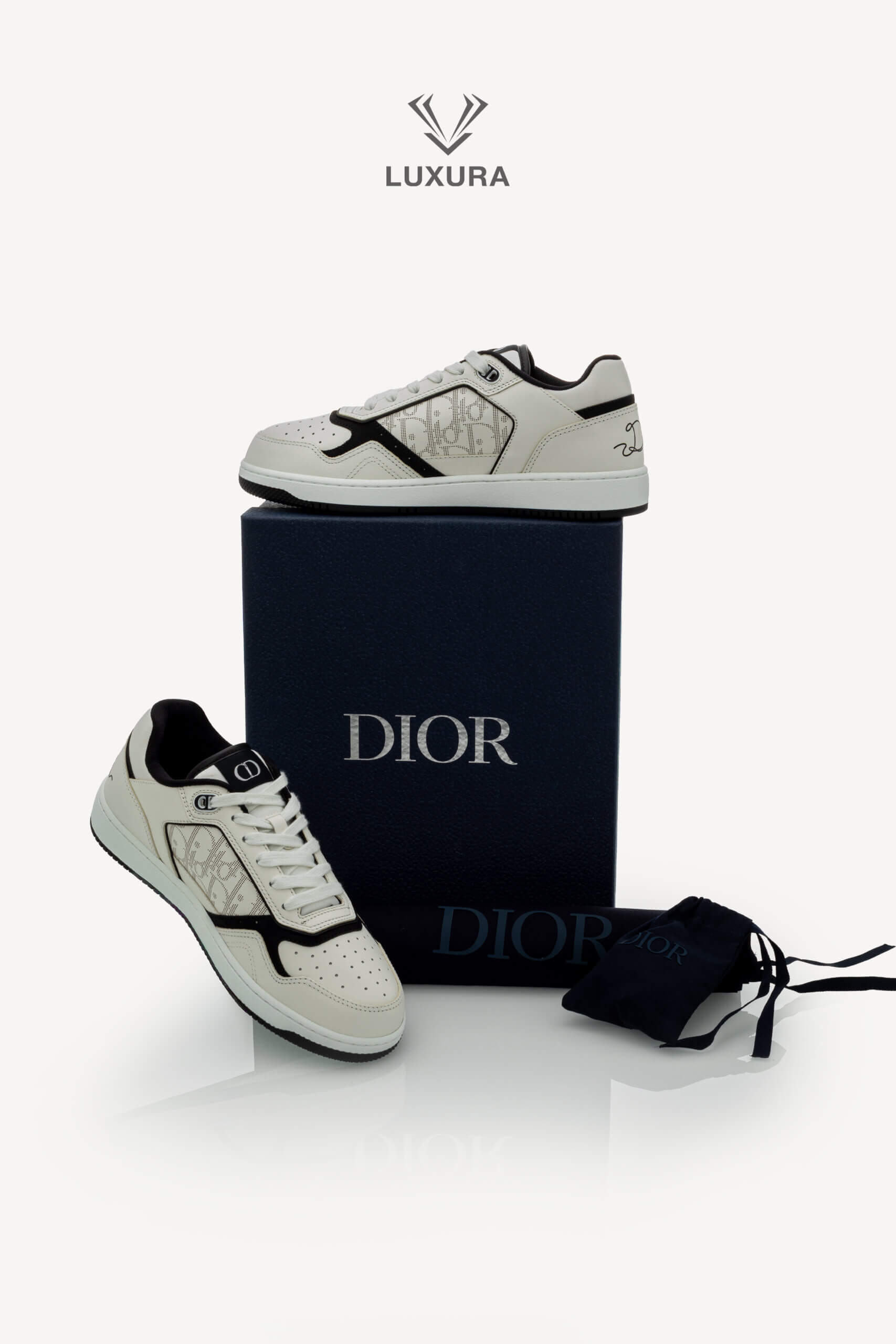<span style="font-size: 10px;letter-spacing: .15em">NEW COLLECTION</span><br>            <strong>DIOR</strong><br>            <div style="margin-top:10px;font-size:16px">B27 Uptown Low-Top Sneaker White Black with White Dior Oblique Galaxy Leather 41 </div><br> - Image 2