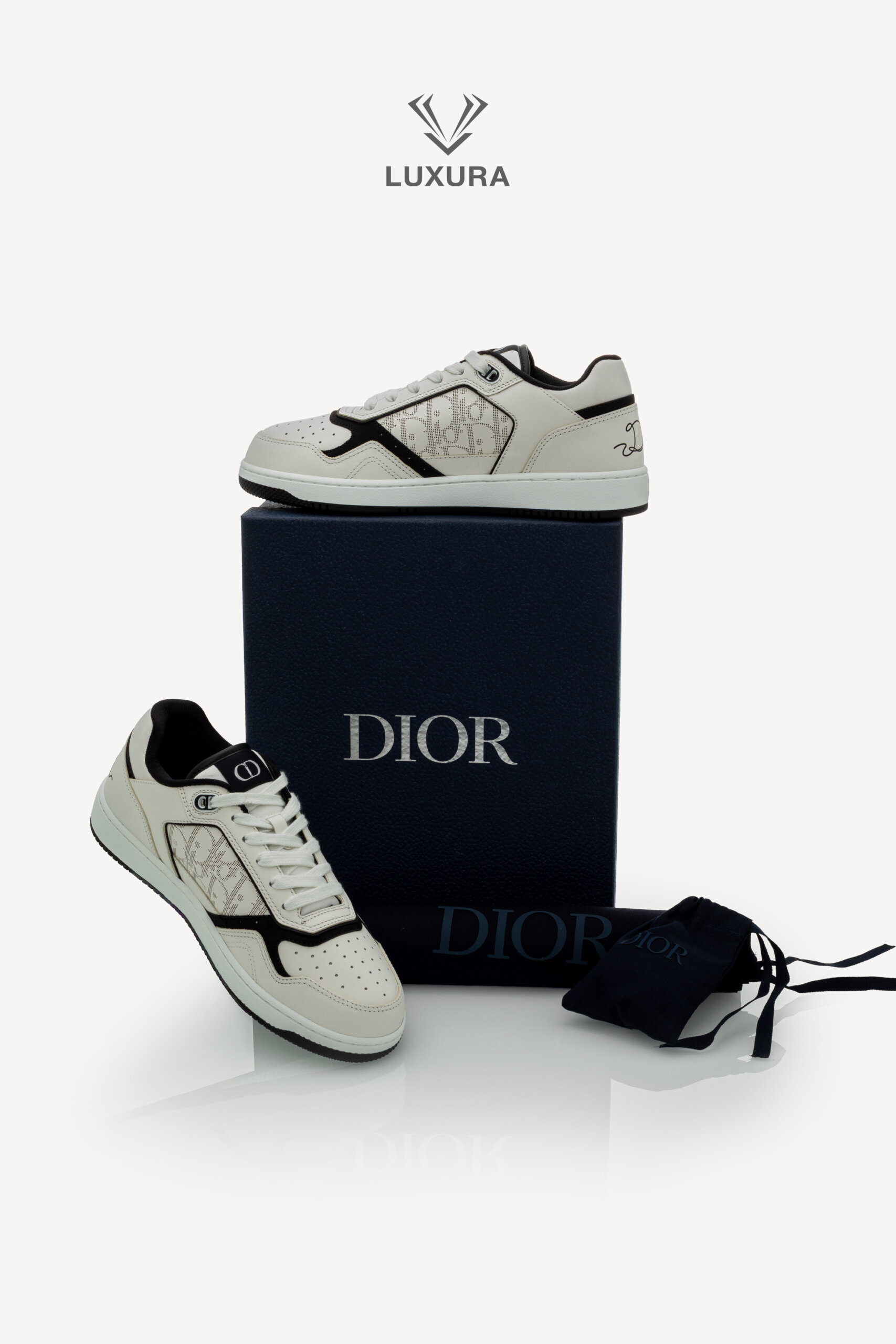 <span style="font-size: 10px;letter-spacing: .15em">NEW COLLECTION</span><br>            <strong>DIOR</strong><br>            <div style="margin-top:10px;font-size:16px">B27 Uptown Low-Top Sneaker White Black with White Dior Oblique Galaxy Leather 42 </div><br> - Image 2