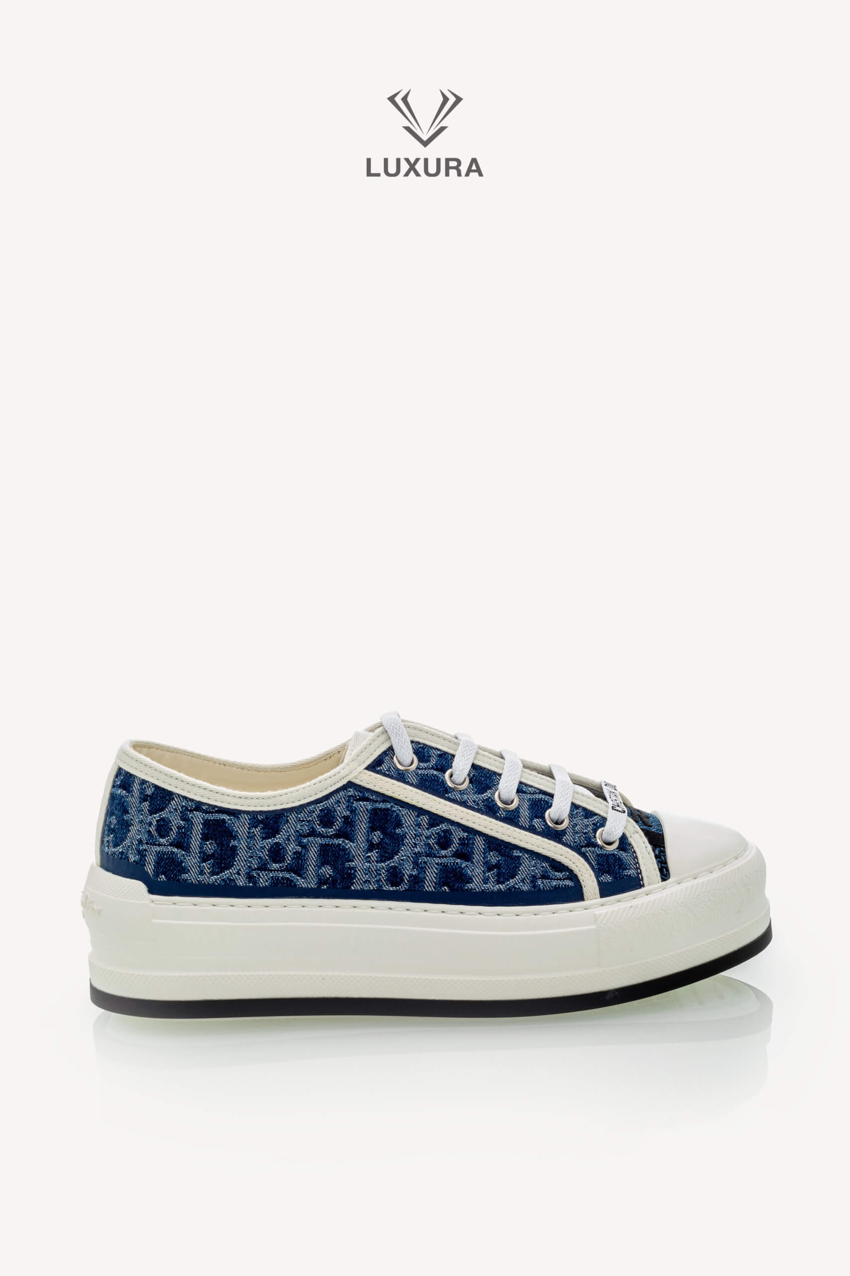 <span style="font-size: 10px;letter-spacing: .15em">NEW COLLECTION</span><br>            <strong>DIOR</strong><br>            <div style="margin-top:10px;font-size:16px">Walk n Dior Platform Sneaker Blue Effect Cotton Denim Embroidered with Dior Oblique Motif 37.5 </div><br>