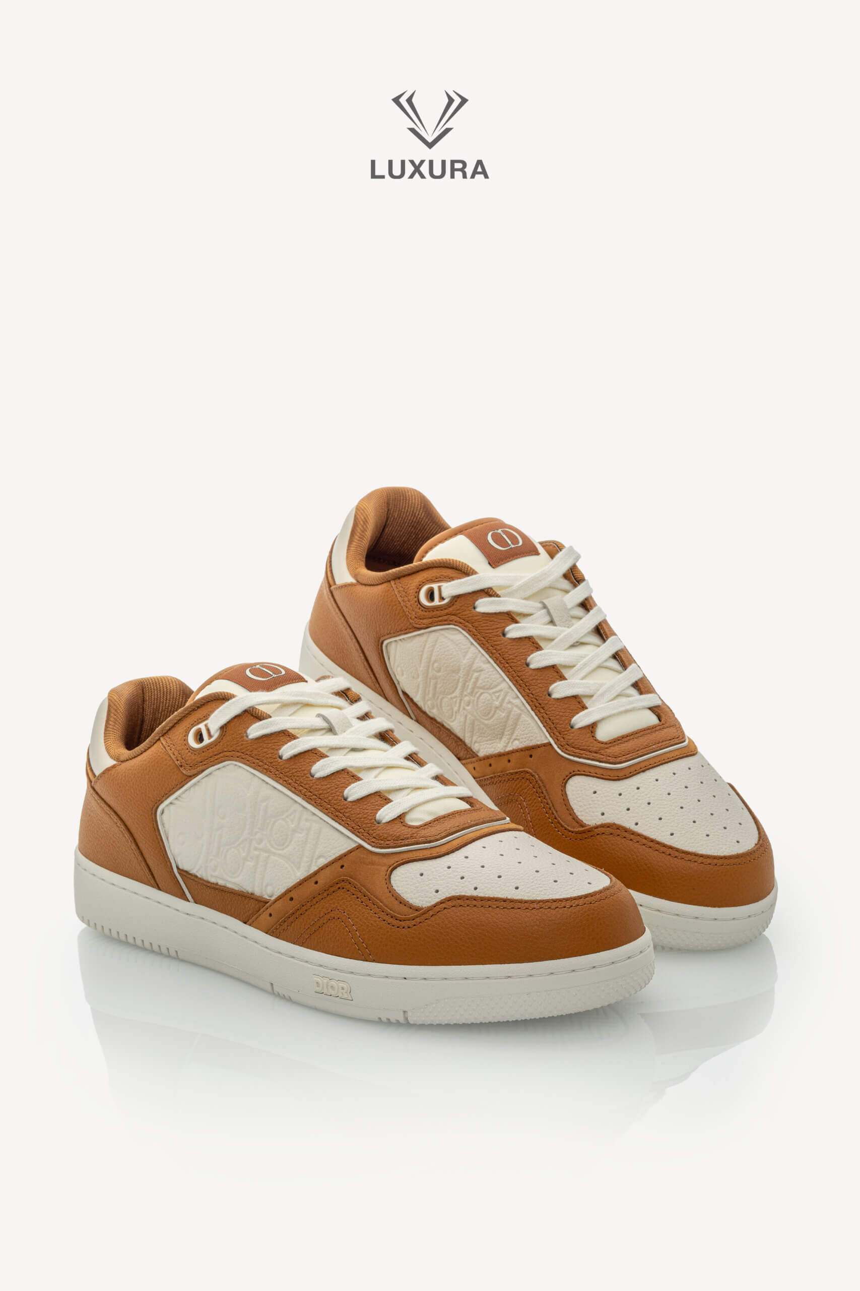 <span style="font-size: 10px;letter-spacing: .15em">NEW COLLECTION</span><br>            <strong>DIOR</strong><br>            <div style="margin-top:10px;font-size:16px">B27 Uptown Low-Top Sneaker Cognac and White with White Dior Gravity Leather 44 </div><br> - Image 3