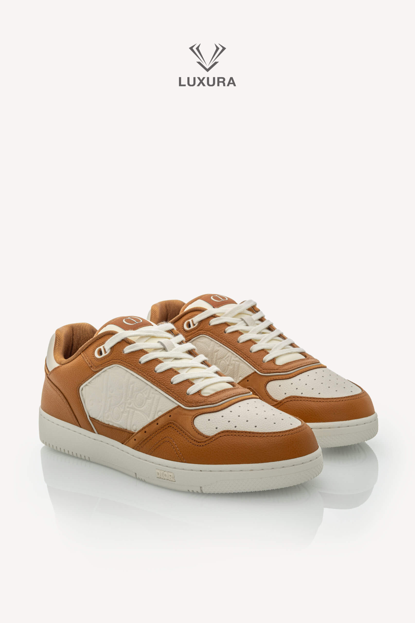 <span style="font-size: 10px;letter-spacing: .15em">NEW COLLECTION</span><br>            <strong>DIOR</strong><br>            <div style="margin-top:10px;font-size:16px">B27 Uptown Low-Top Sneaker Cognac and White with White Dior Gravity Leather 44 </div><br> - Image 5