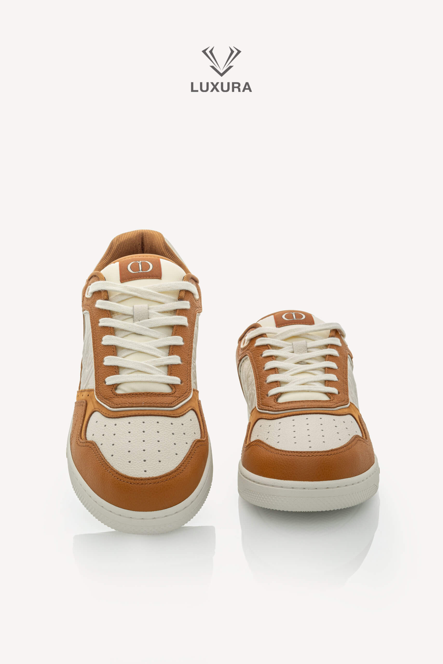 <span style="font-size: 10px;letter-spacing: .15em">NEW COLLECTION</span><br>            <strong>DIOR</strong><br>            <div style="margin-top:10px;font-size:16px">B27 Uptown Low-Top Sneaker Cognac and White with White Dior Gravity Leather 44 </div><br> - Image 4