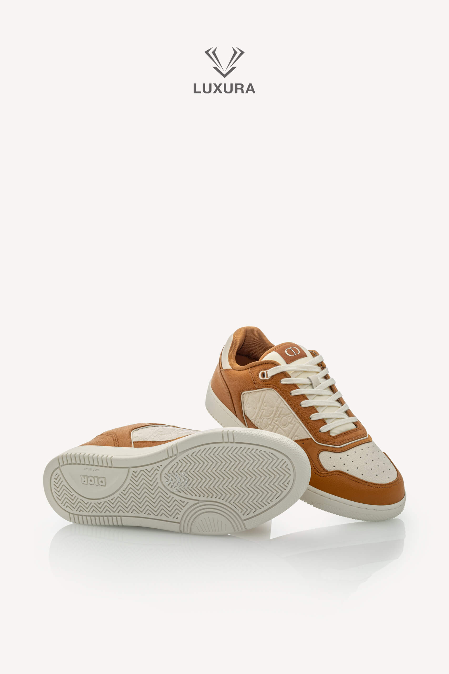 <span style="font-size: 10px;letter-spacing: .15em">NEW COLLECTION</span><br>            <strong>DIOR</strong><br>            <div style="margin-top:10px;font-size:16px">B27 Uptown Low-Top Sneaker Cognac and White with White Dior Gravity Leather 44 </div><br> - Image 22